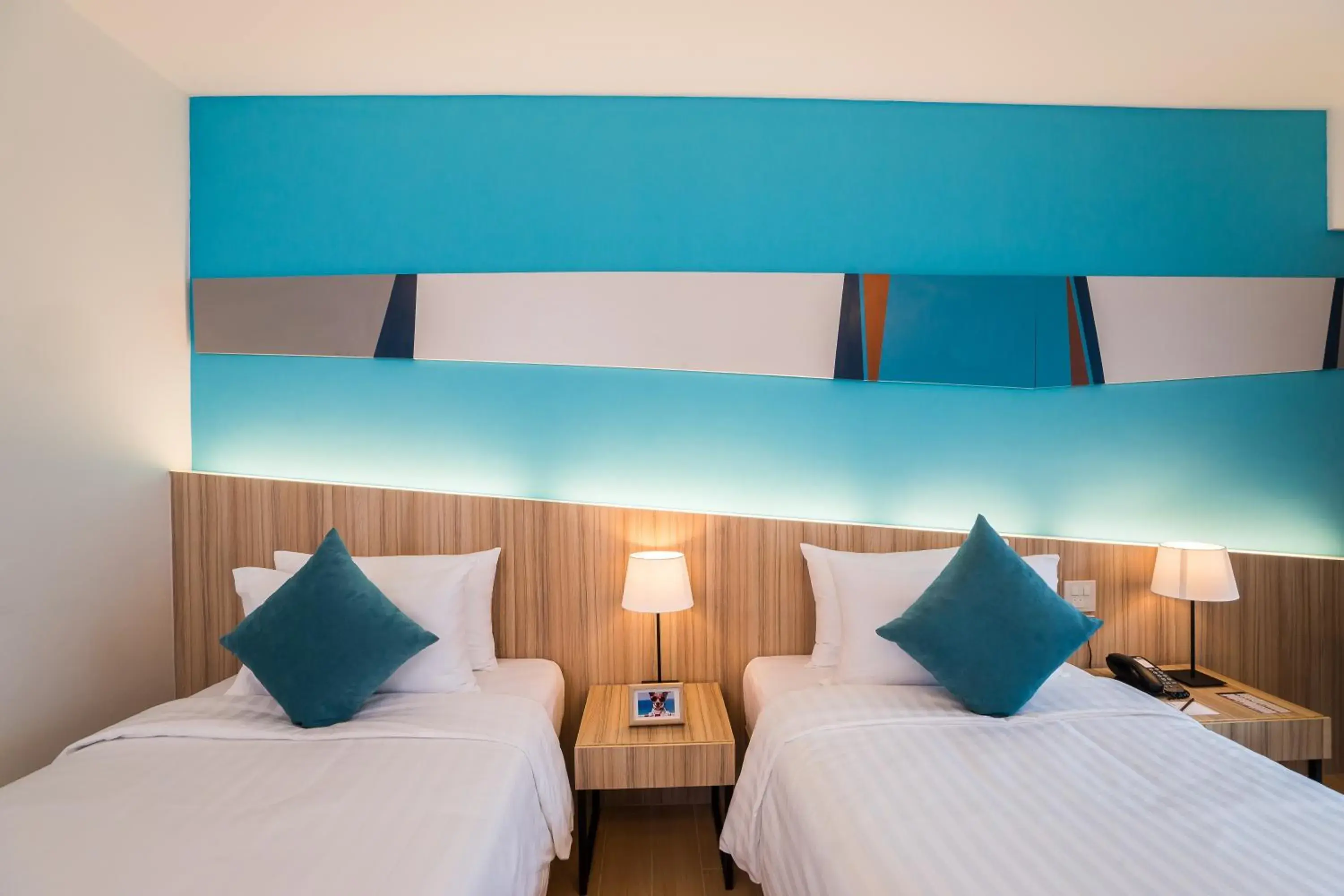 Bed in J Inspired Hotel Pattaya (SHA Plus)