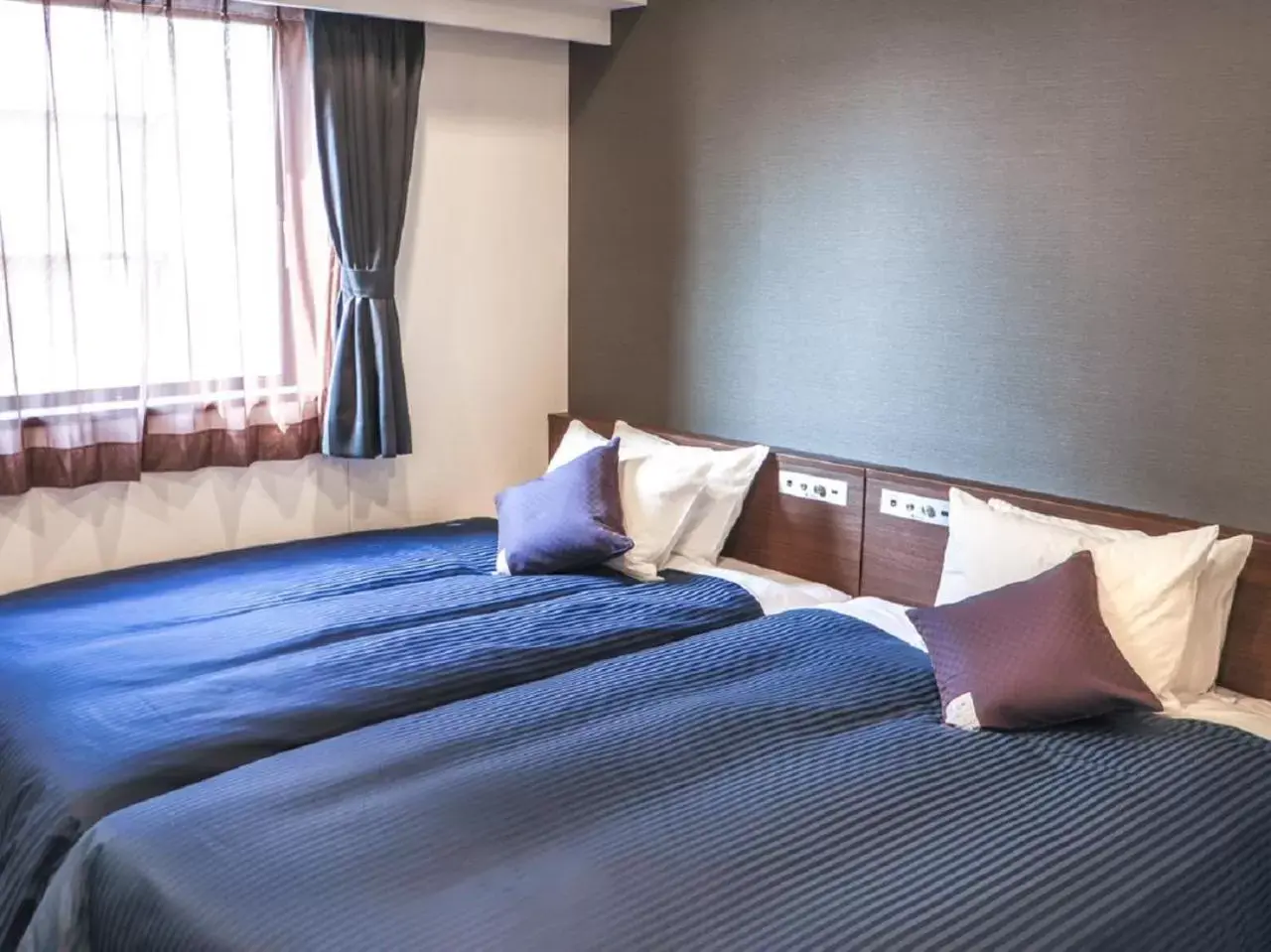 Bed in HOTEL LiVEMAX Chiba Minato Eki-mae