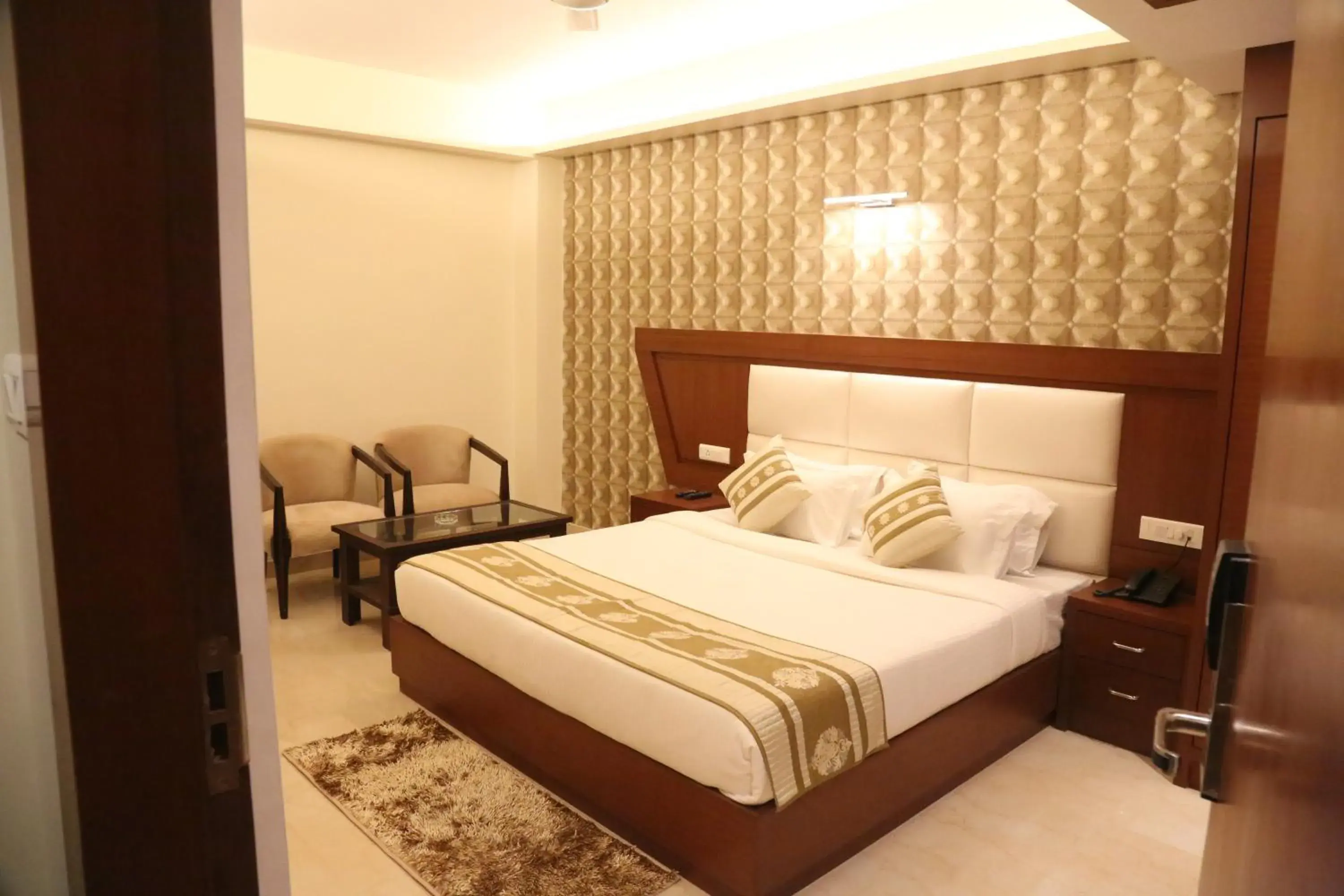 Photo of the whole room, Bed in Hotel Varanasi Inn