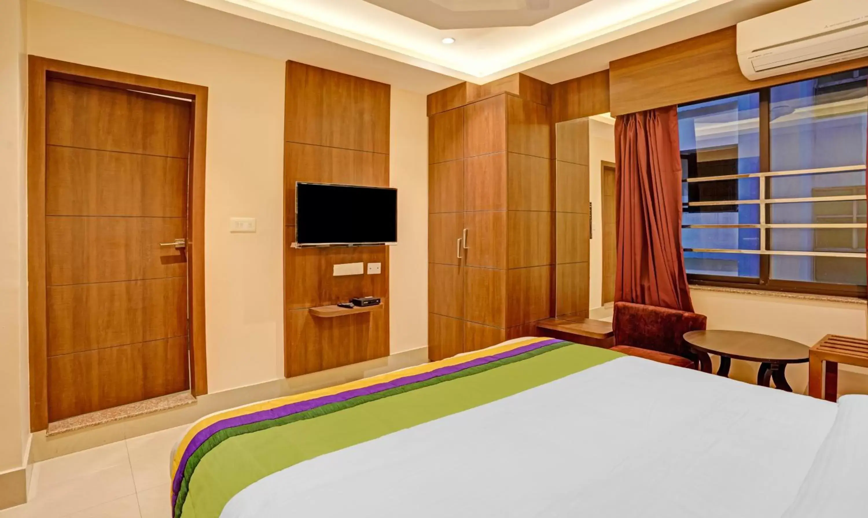 TV and multimedia, Bed in Treebo Indrapuri Hotel & Resort, Siliguri Junction TV and multimedia, Bed in Treebo Indrapuri Hotel & Resort, Siliguri Junction