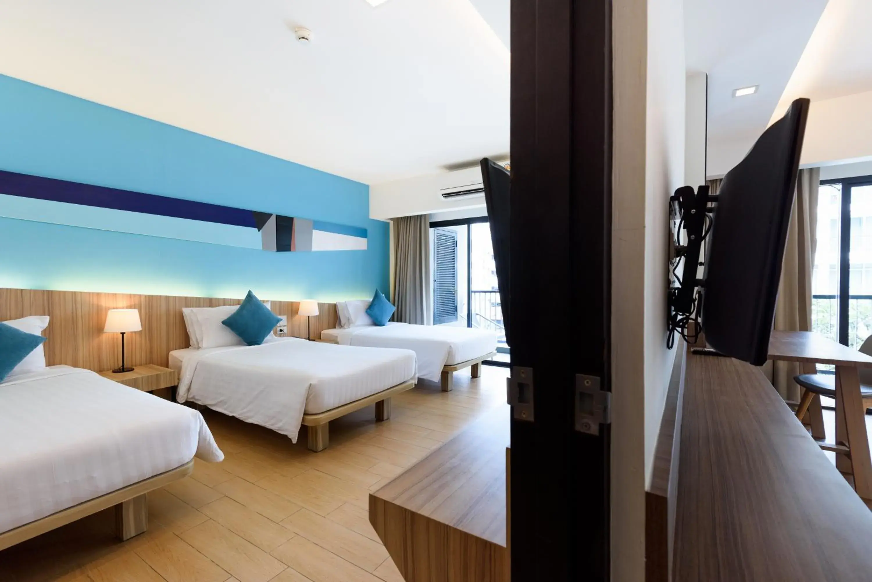 Bed in J Inspired Hotel Pattaya (SHA Plus)