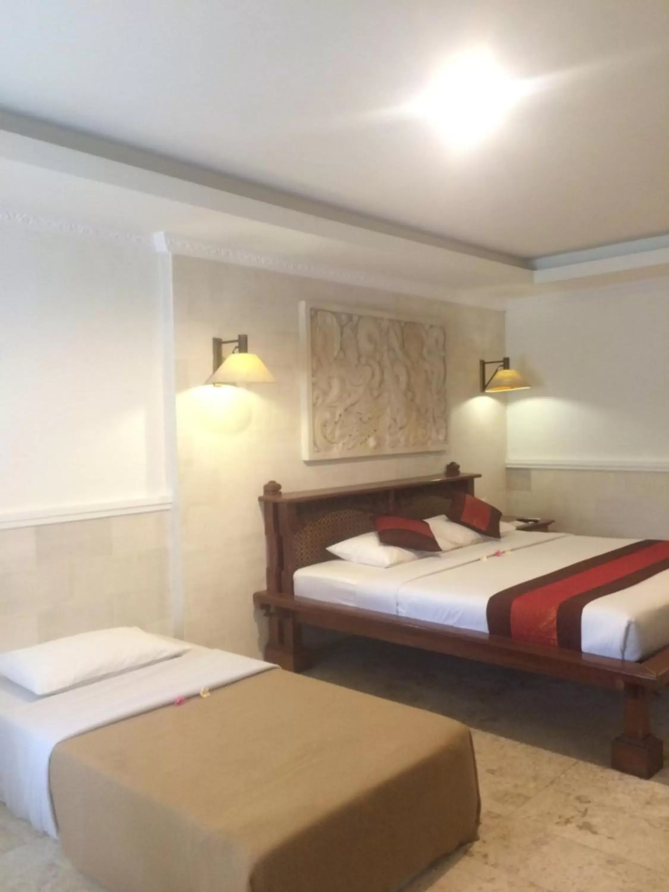 Bed in Melasti Beach Resort & Spa Legian