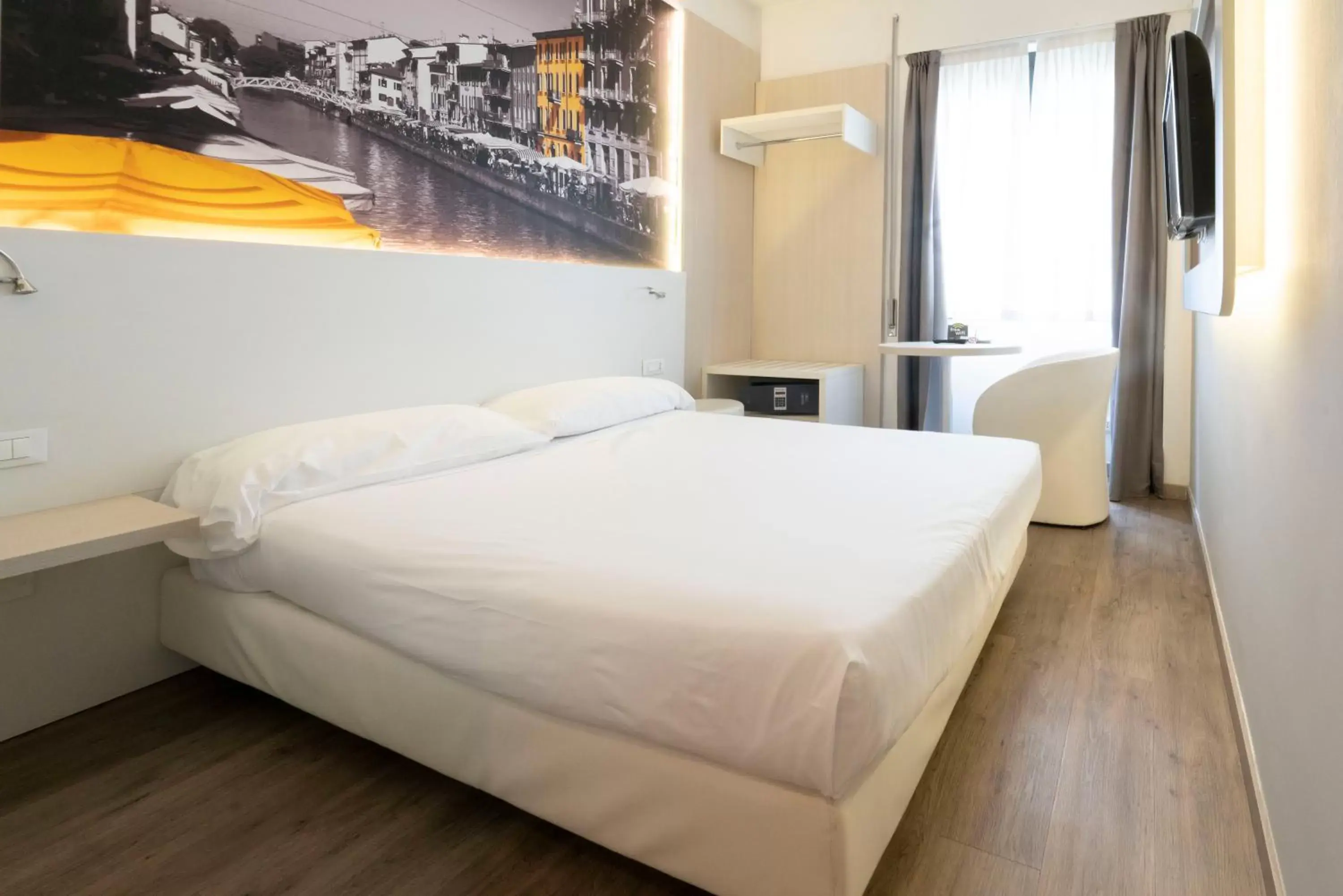 Bed in Kleos Hotel Milano