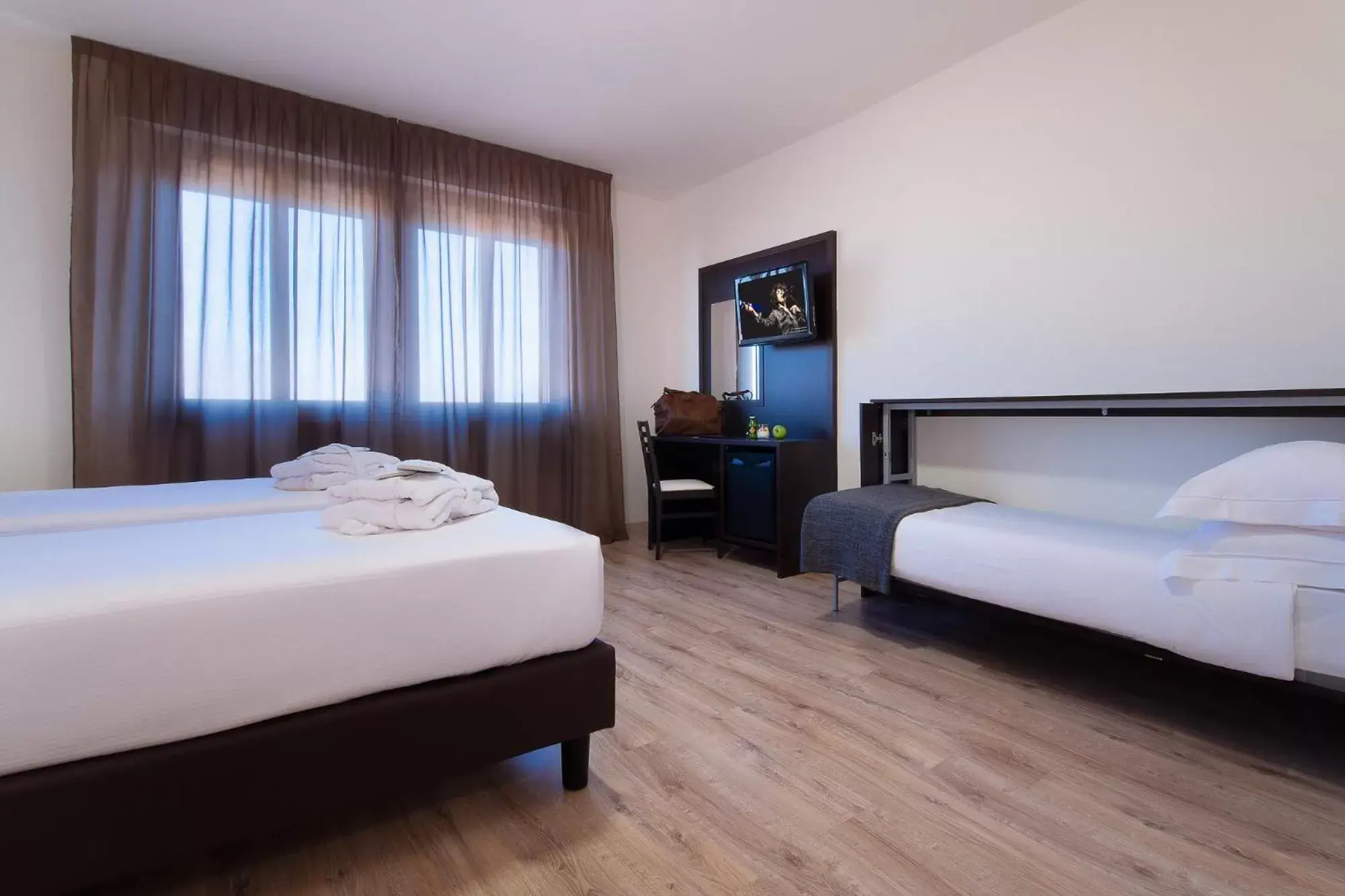 Bedroom, Bed in CDH Hotel Modena