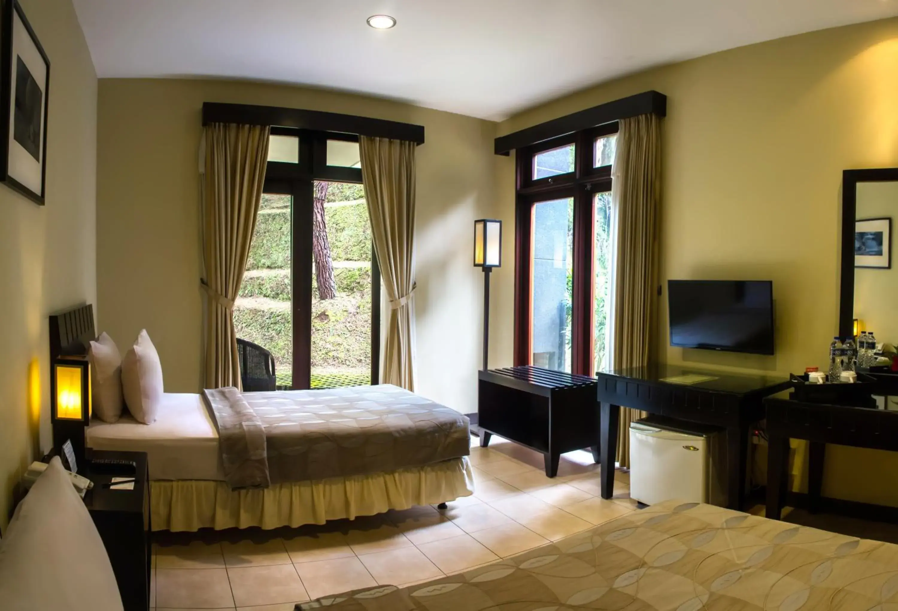 Photo of the whole room, Bed in Puteri Gunung Hotel