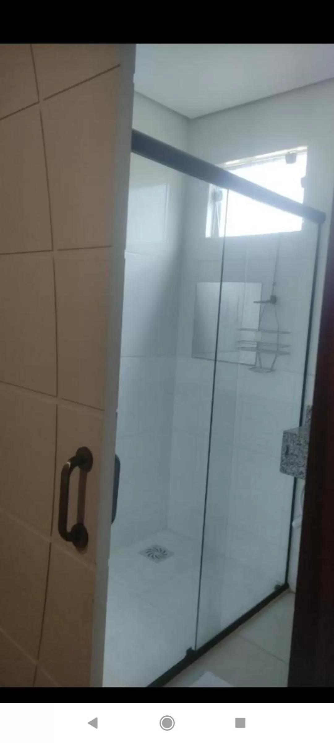 Bathroom in Pousada da Gi Suítes e Turismo