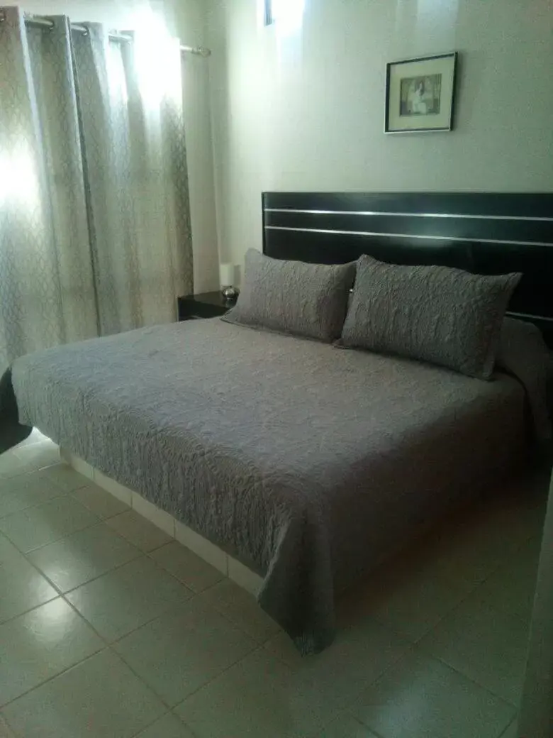 Bed in Hotel y Suites Los Encantos