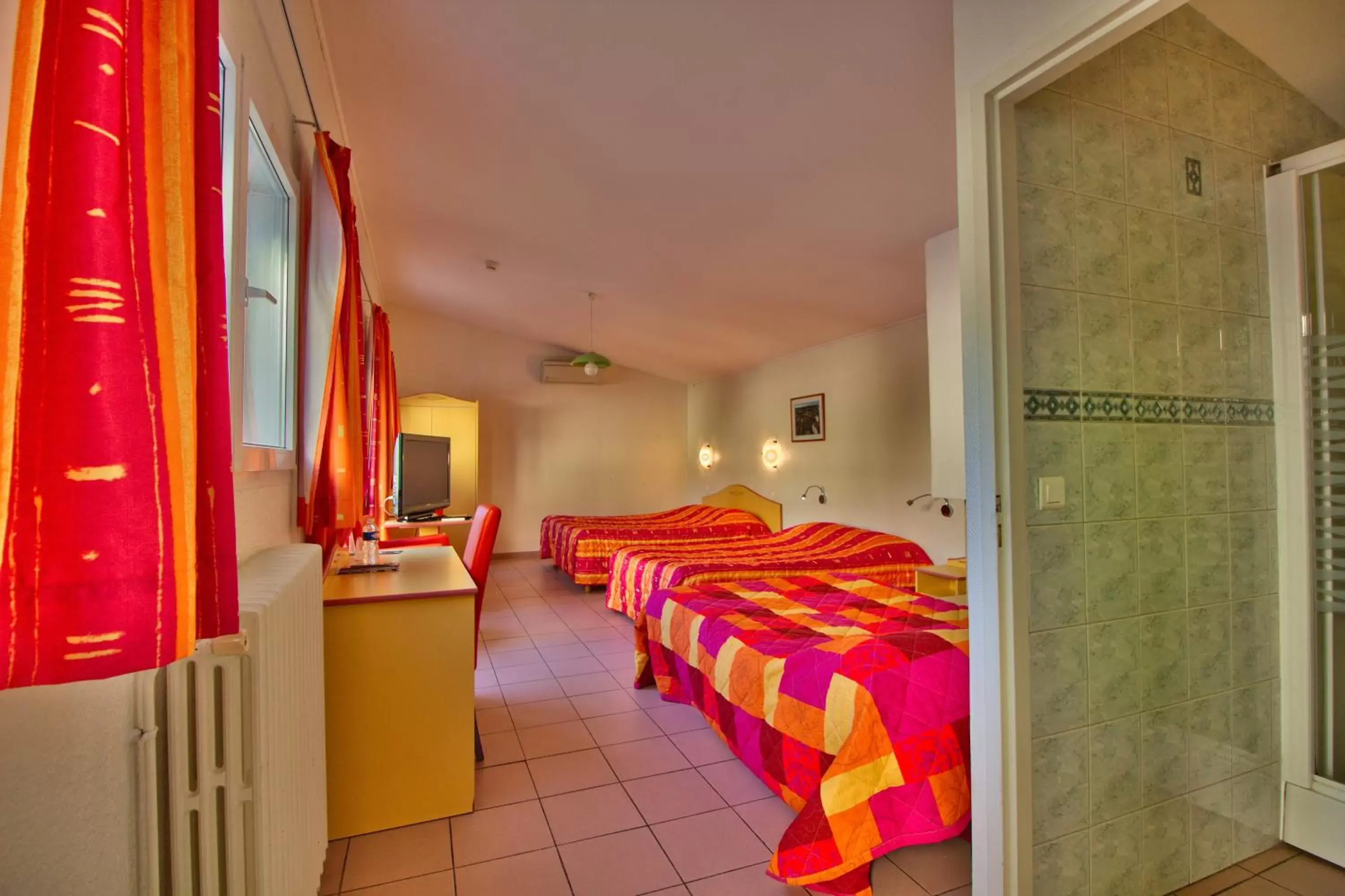 Quadruple Room in Logis Hôtel Restaurant Le Chalet du Mont Roland Quadruple Room in Logis Hôtel Restaurant Le Chalet du Mont Roland