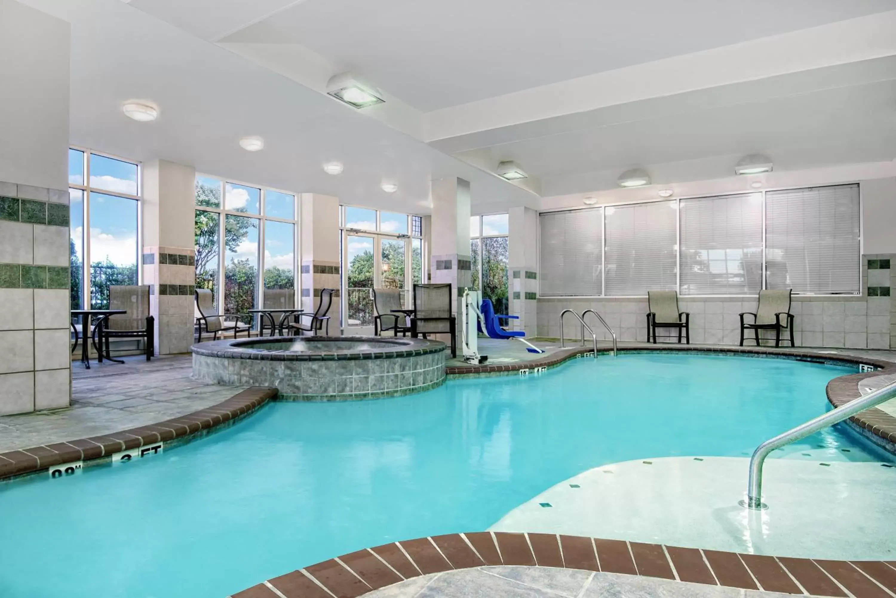 Swimming Pool in Holiday Inn & Suites College Station-Aggieland, an IHG Hotel