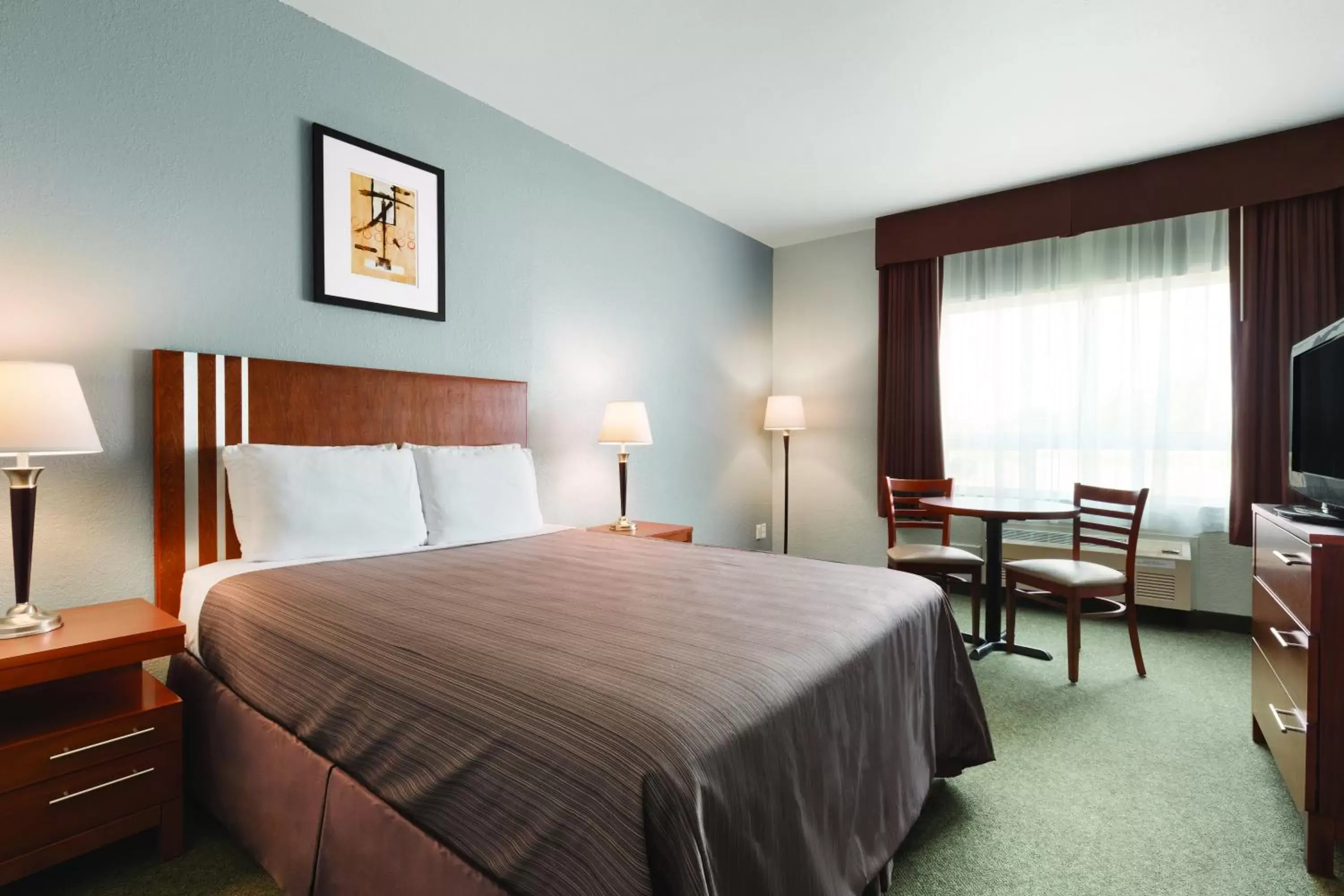 Photo of the whole room, Bed in Days Inn by Wyndham High Prairie