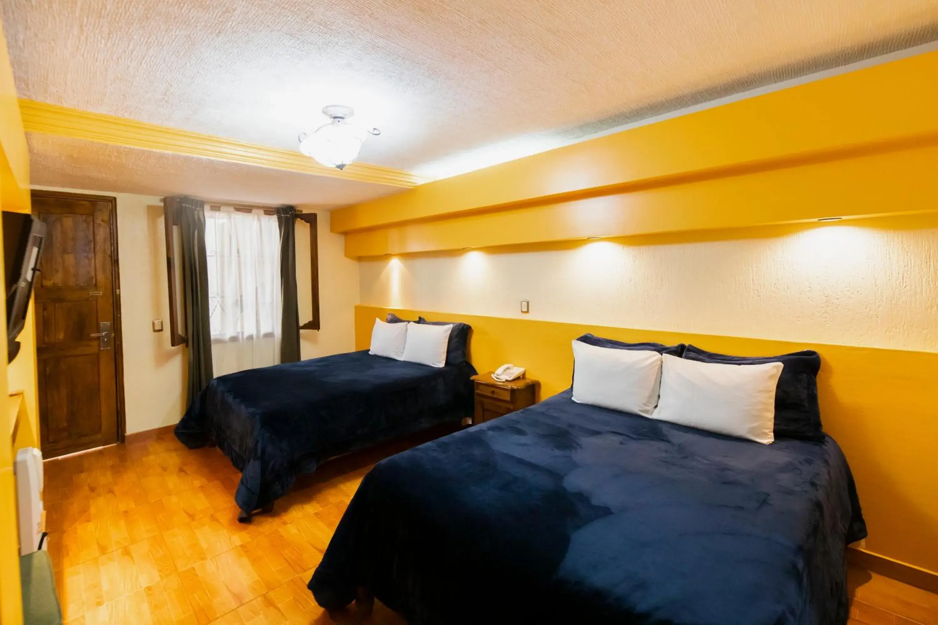 Bed in Gran Hotel El Encanto Bed in Gran Hotel El Encanto