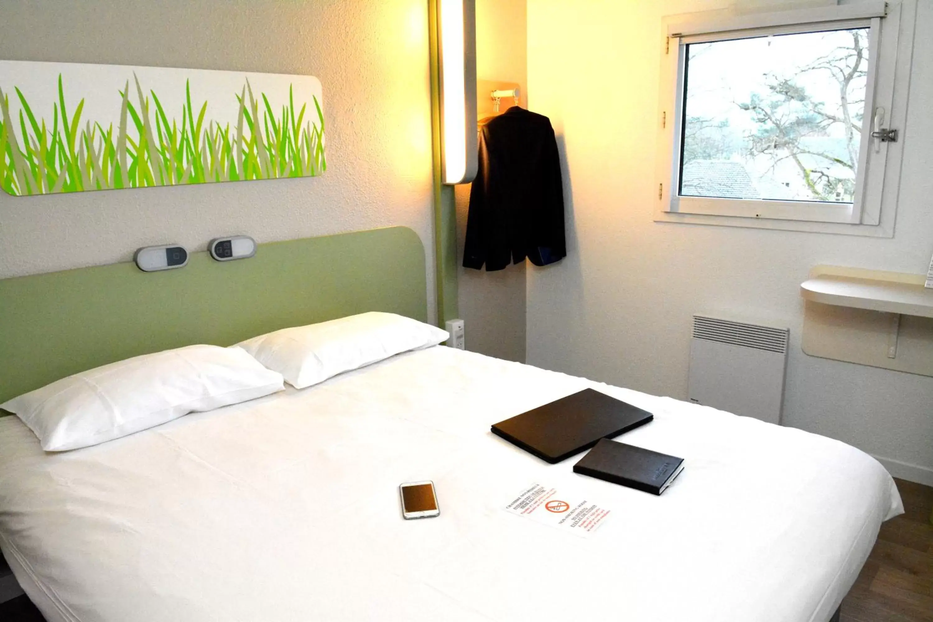 Photo of the whole room, Bed in ibis budget Rouen Parc des Expos Zenith