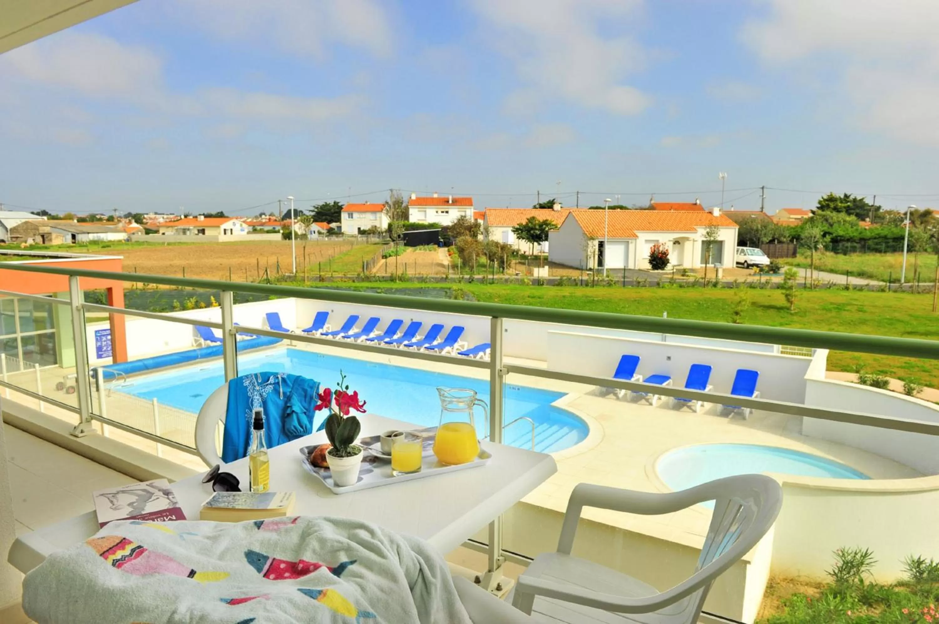 Balcony/Terrace, Pool View in Résidence Goélia La Grande Plage