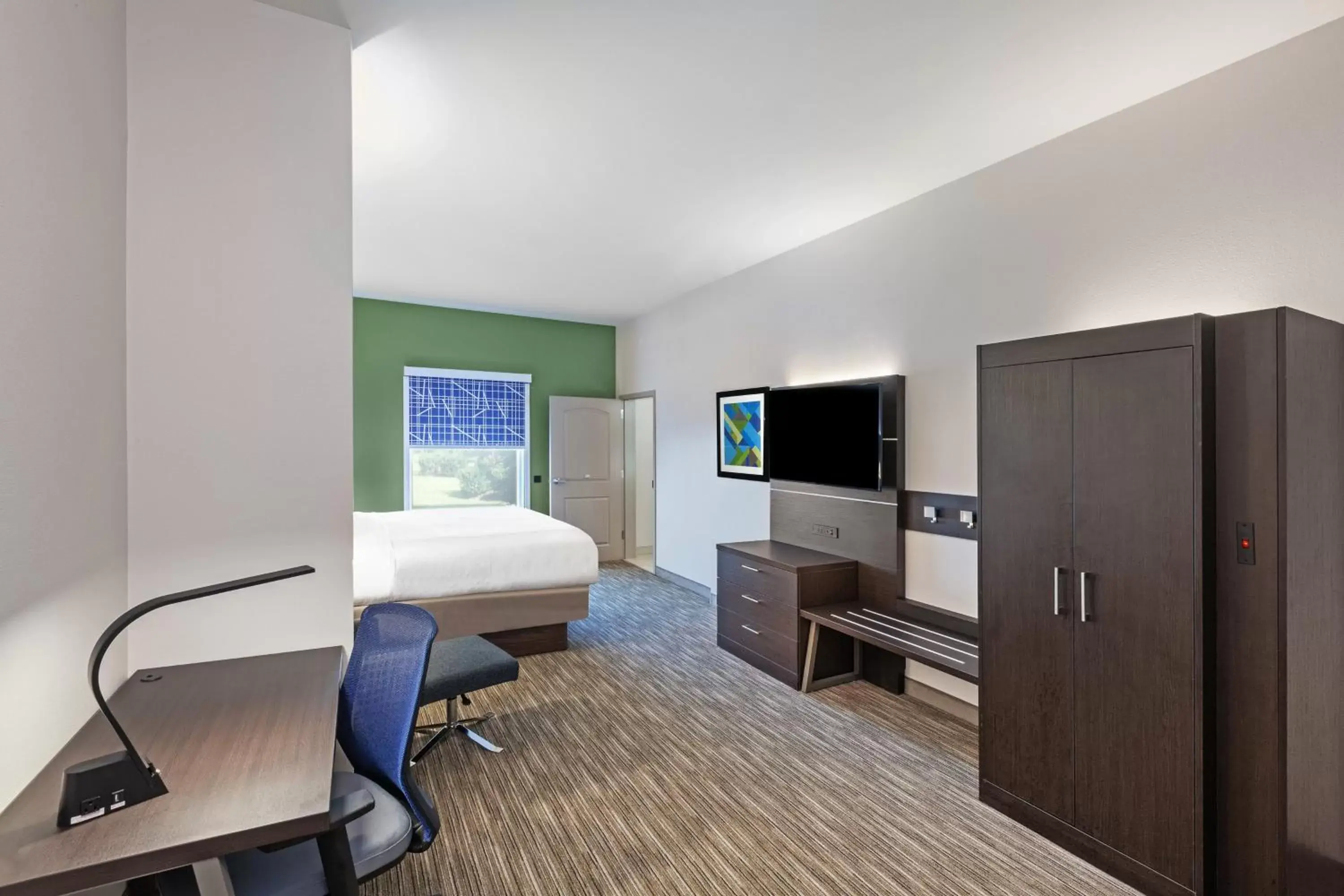 Photo of the whole room, TV/Entertainment Center in Holiday Inn Express & Suites Baton Rouge East, an IHG Hotel