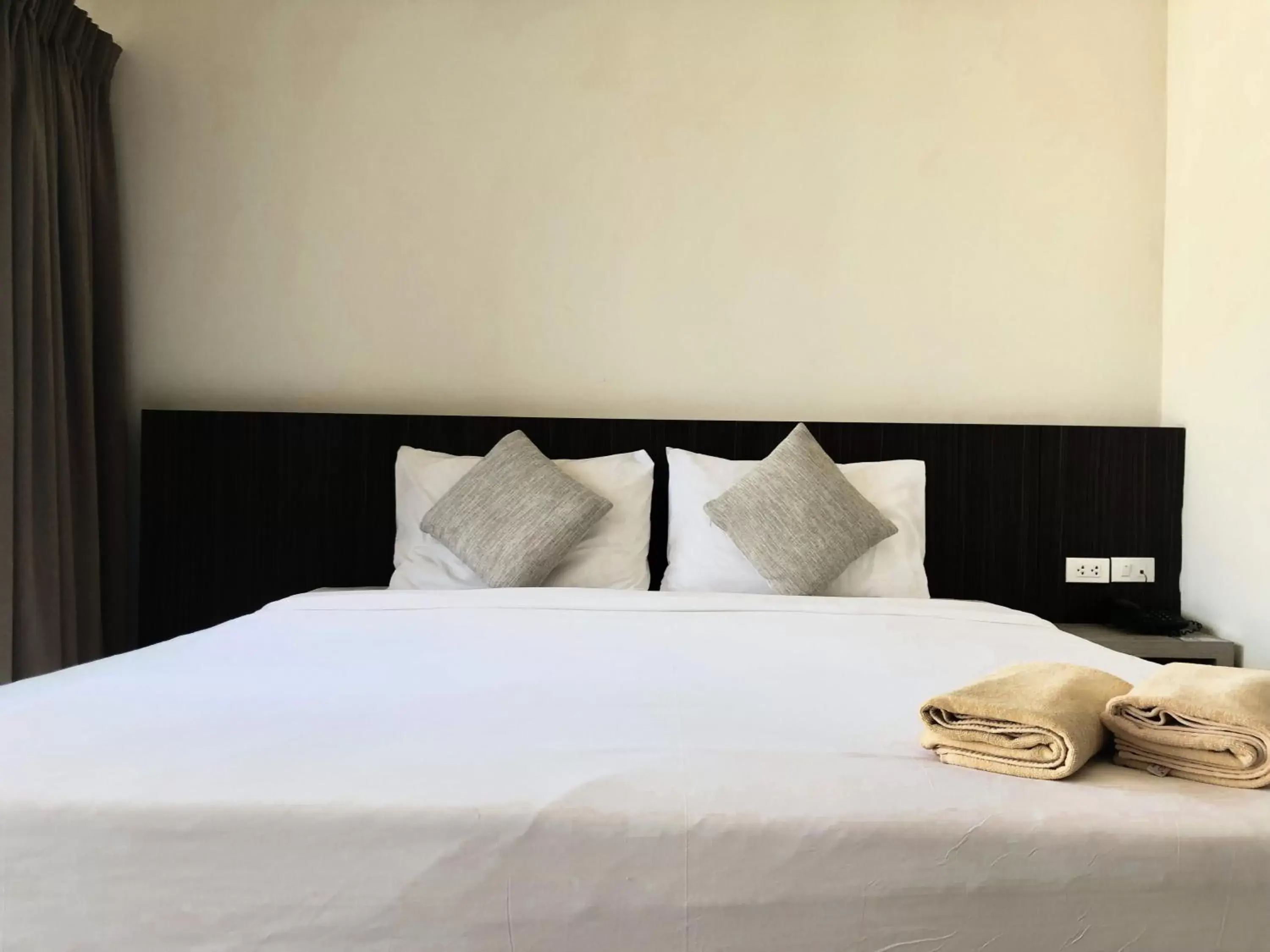 Bed in Leenova Hotel