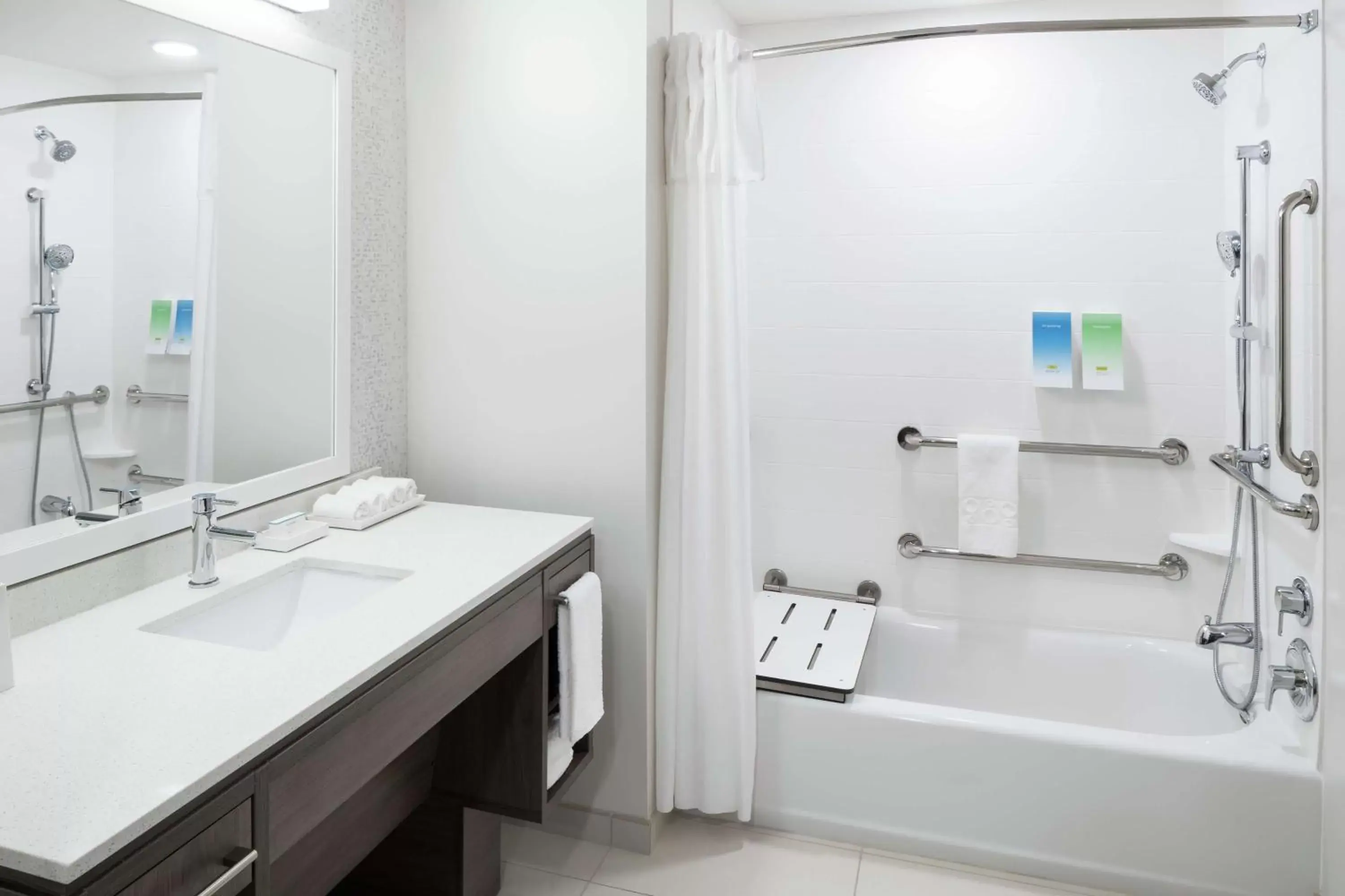 Bathroom in Home2 Suites By Hilton Orlando Airport