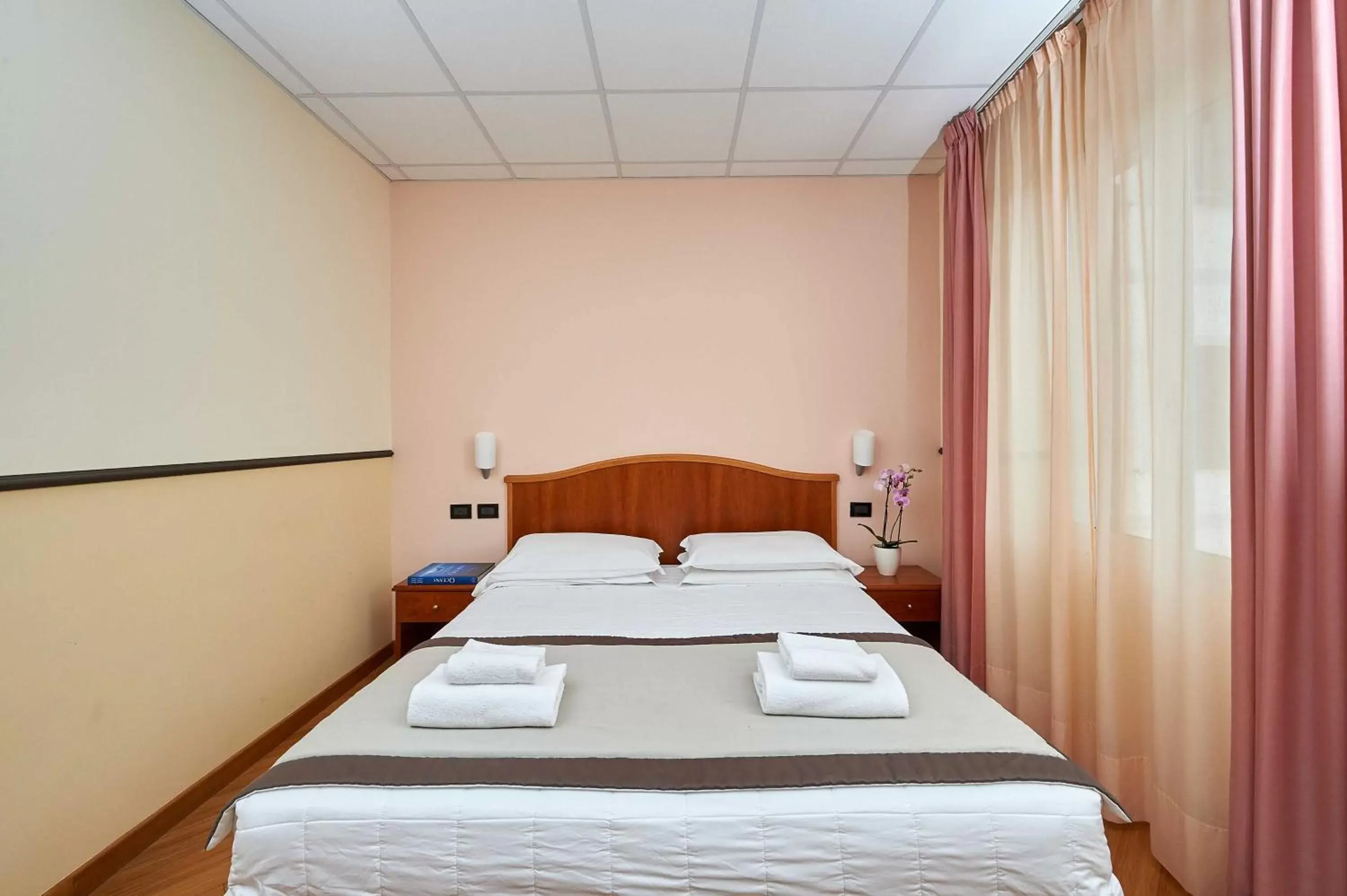 Bed in Hotel Corallo