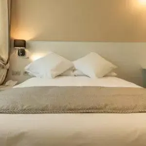 Bed in La Dolce Vita Hotel