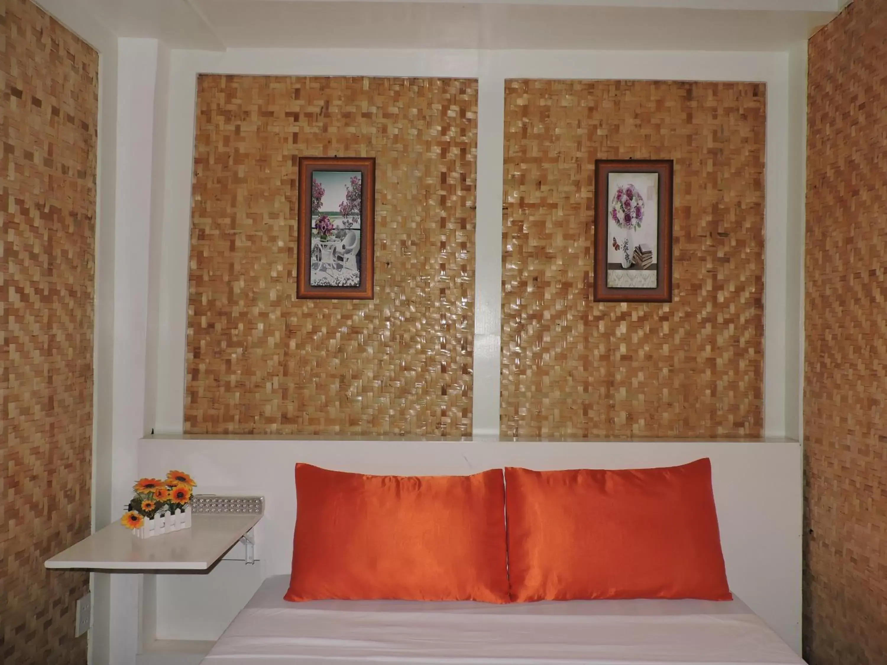 Decorative detail, Bed in Orange Mangrove Pension House