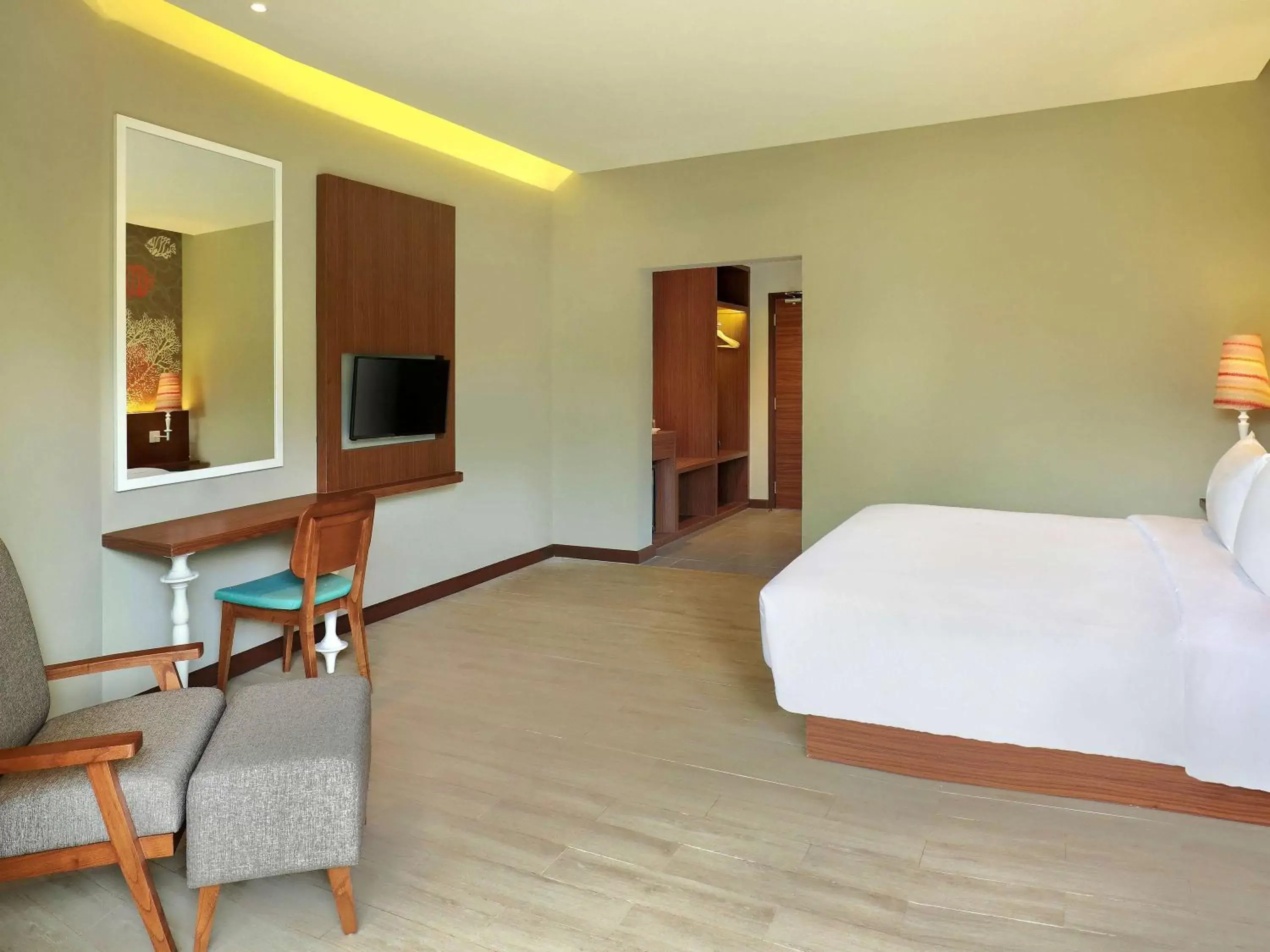 Photo of the whole room, TV/Entertainment Center in Mercure Manado Tateli Resort and Convention