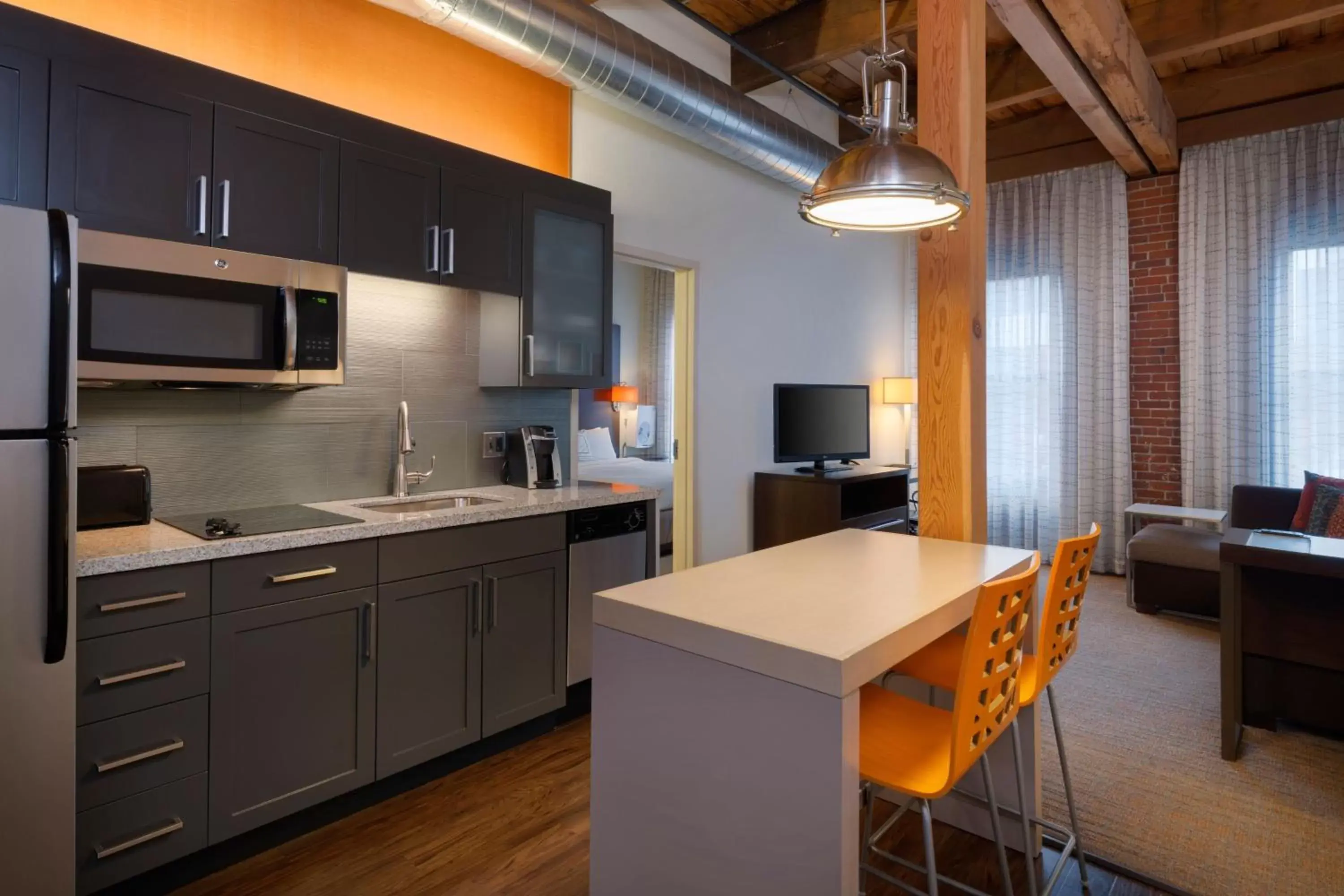 Bedroom, Kitchen/Kitchenette in Residence Inn by Marriott Boston Downtown Seaport