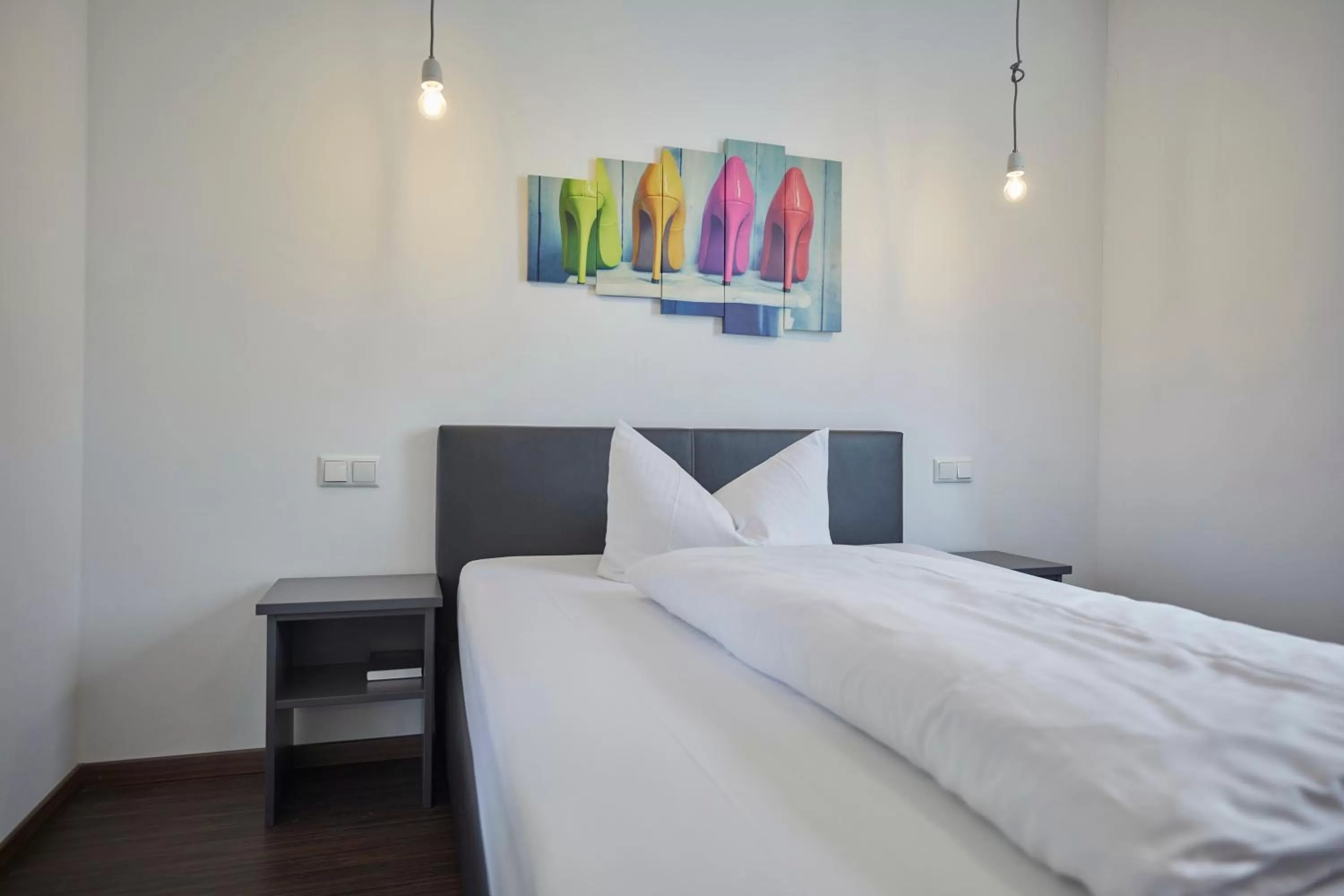 Bed in Hotel Schlemmer Das familäre Altstadt - Hotel mit Herz