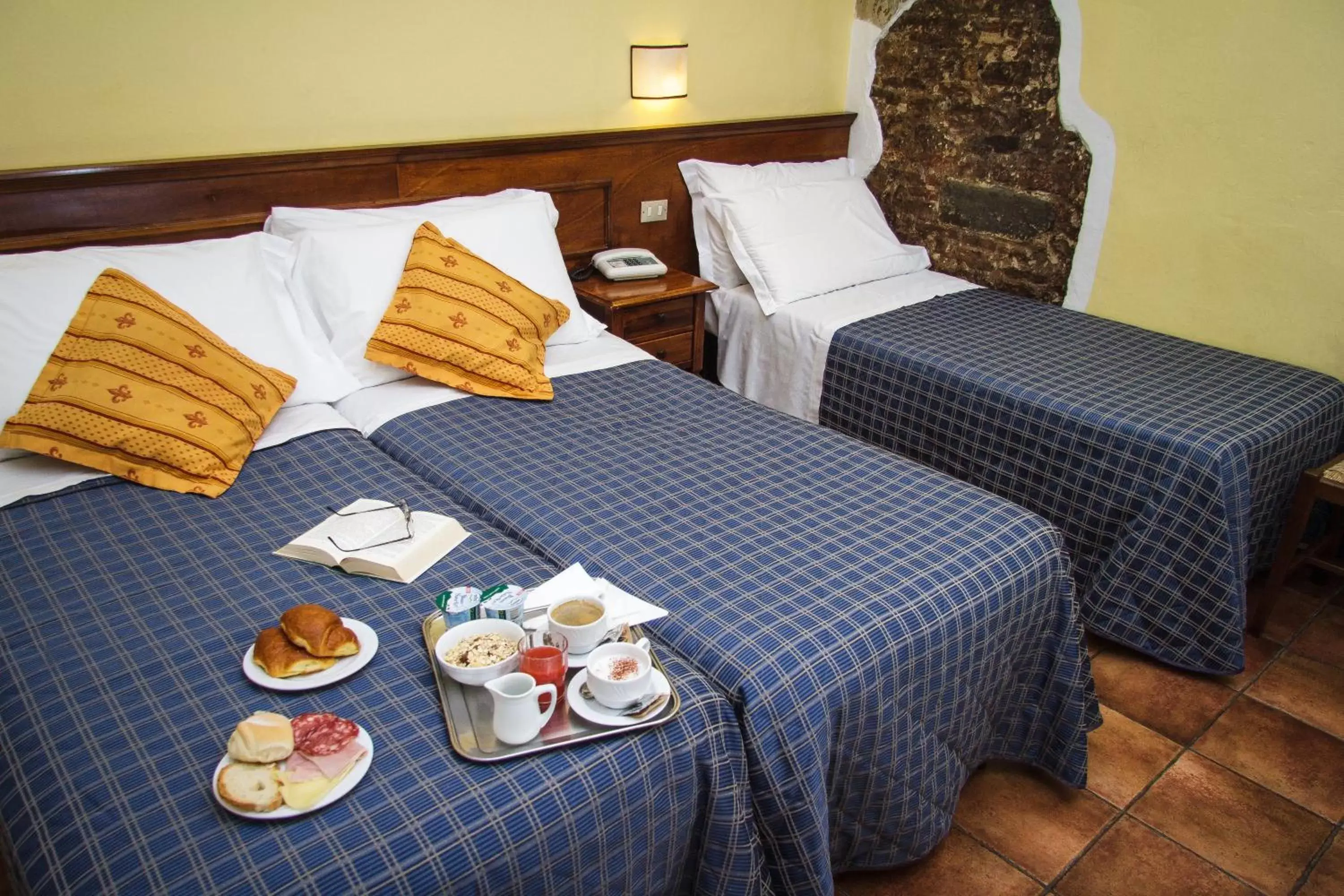 Quadruple Room in Hotel Nizza Quadruple Room in Hotel Nizza