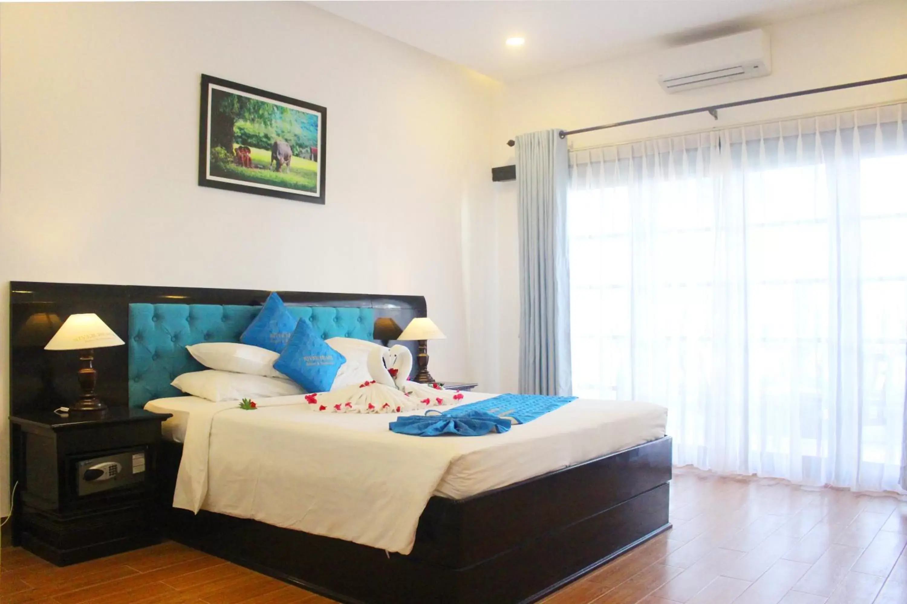 Bed in River Beach Resort & Residences