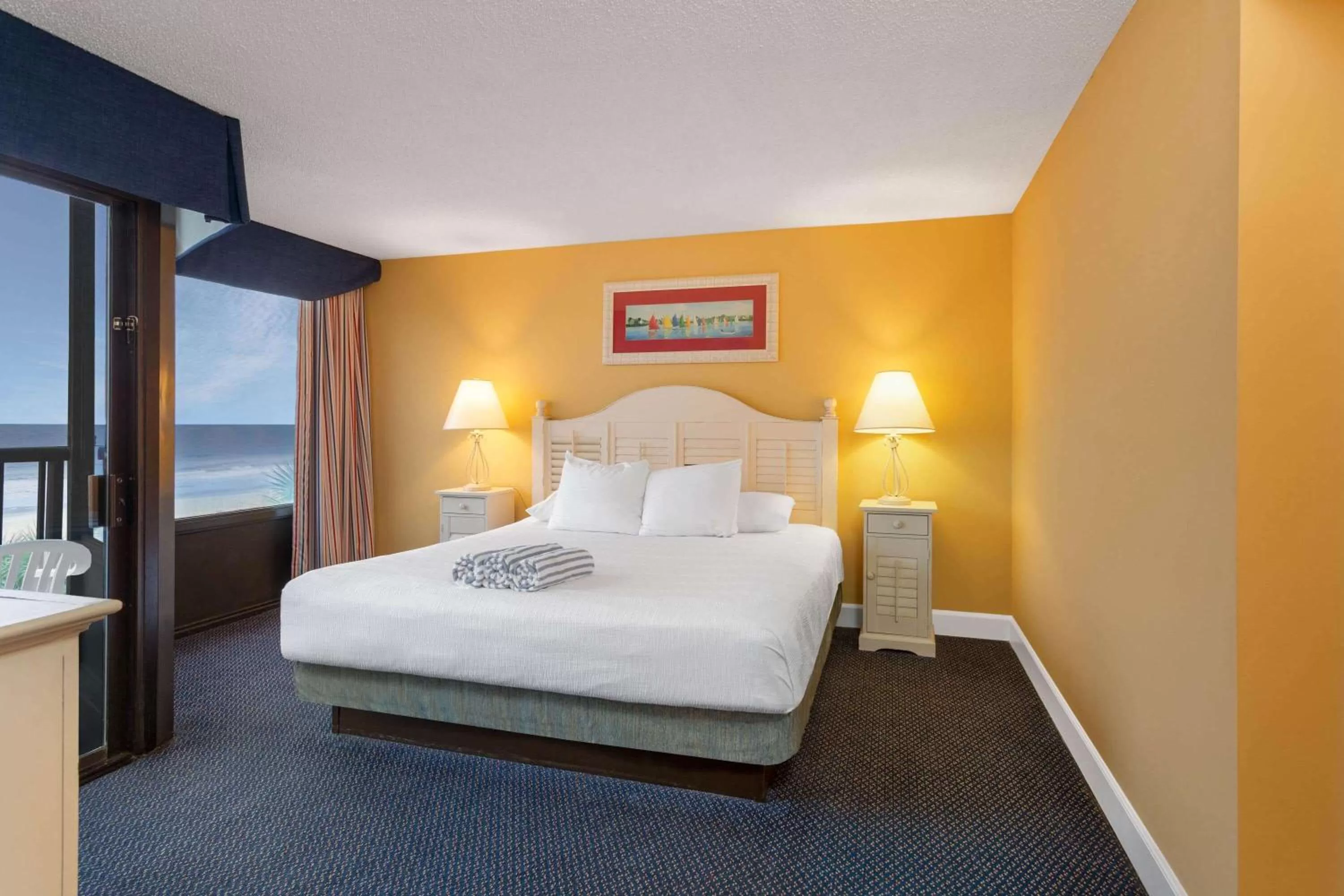 Photo of the whole room, Bed in Ocean Club Resort Myrtle Beach a Ramada by Wyndham