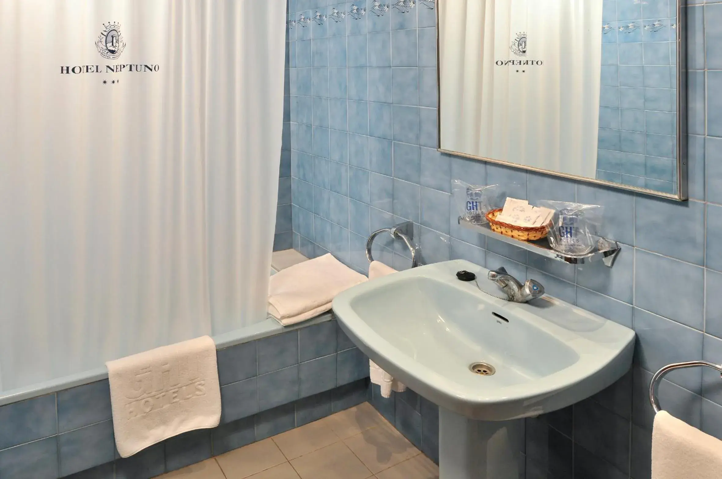 Bathroom in Hotel GHT Neptuno-Tossa & Venus SPA Bathroom in Hotel GHT Neptuno-Tossa & Venus SPA