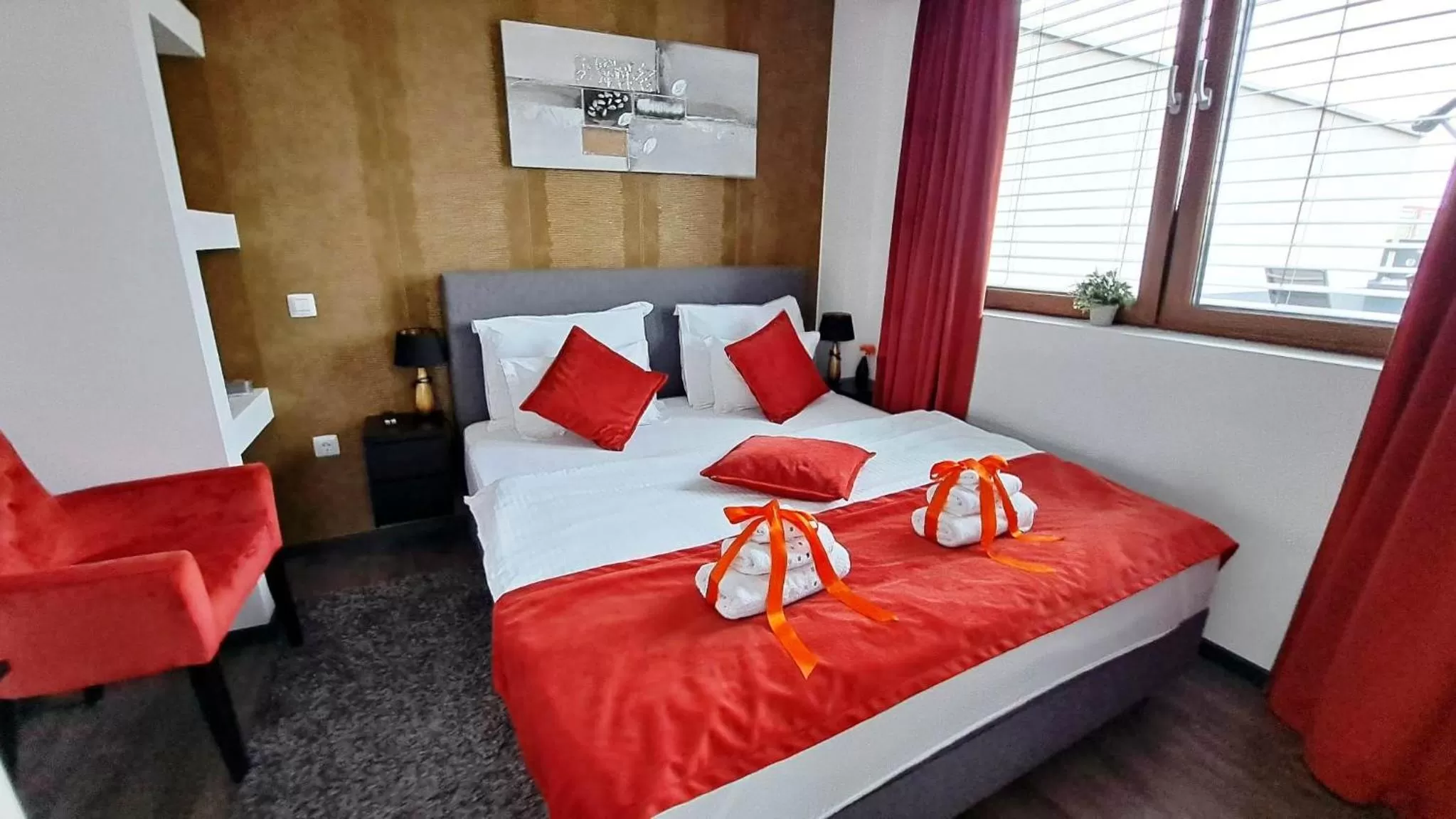 Bed in Arcobaleno Apartments & Rooms
