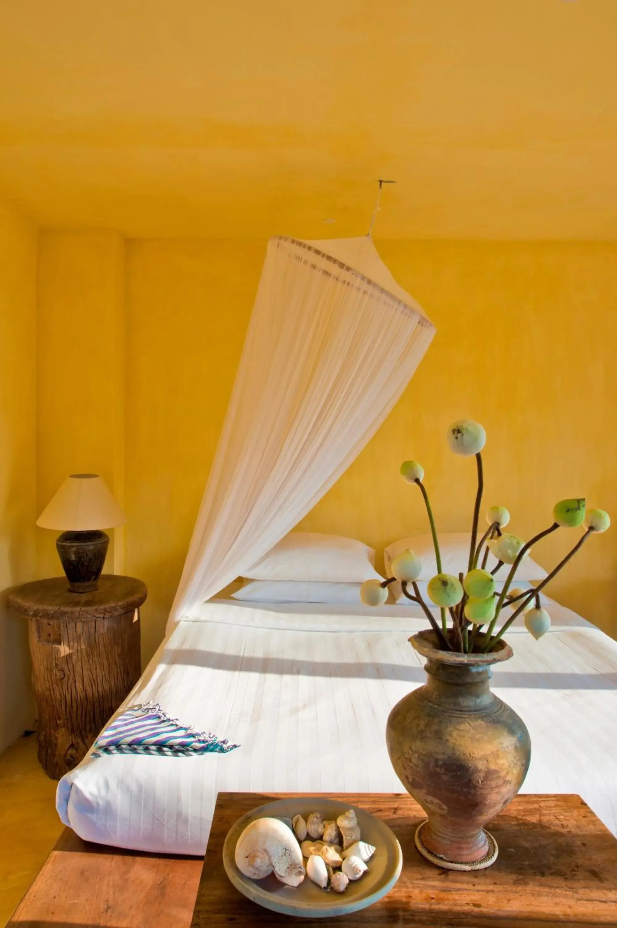 Bed in Knai Bang Chatt Resort Bed in Knai Bang Chatt Resort