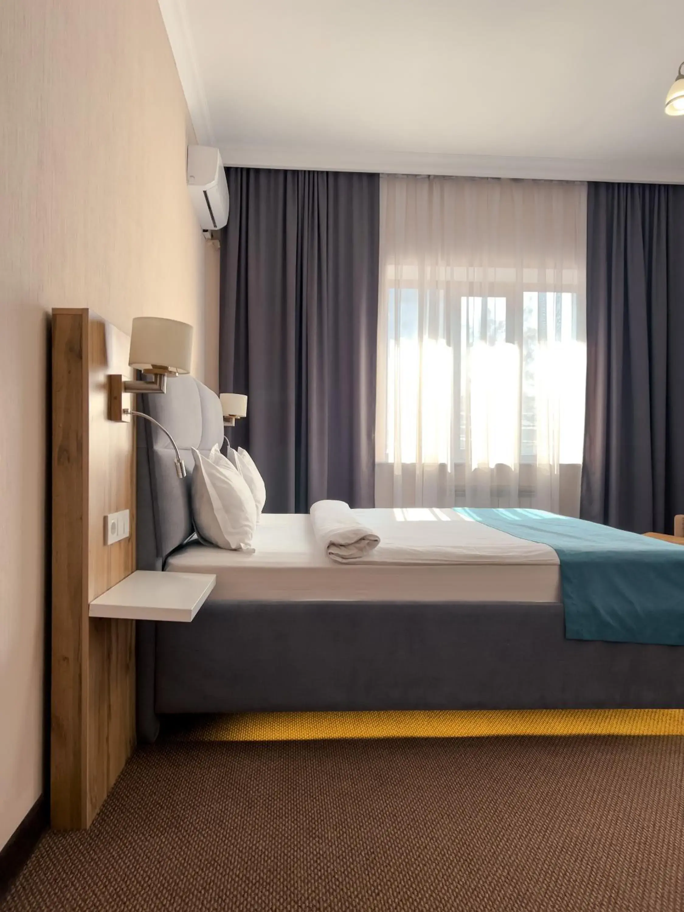 Bed in Keremet Hotel