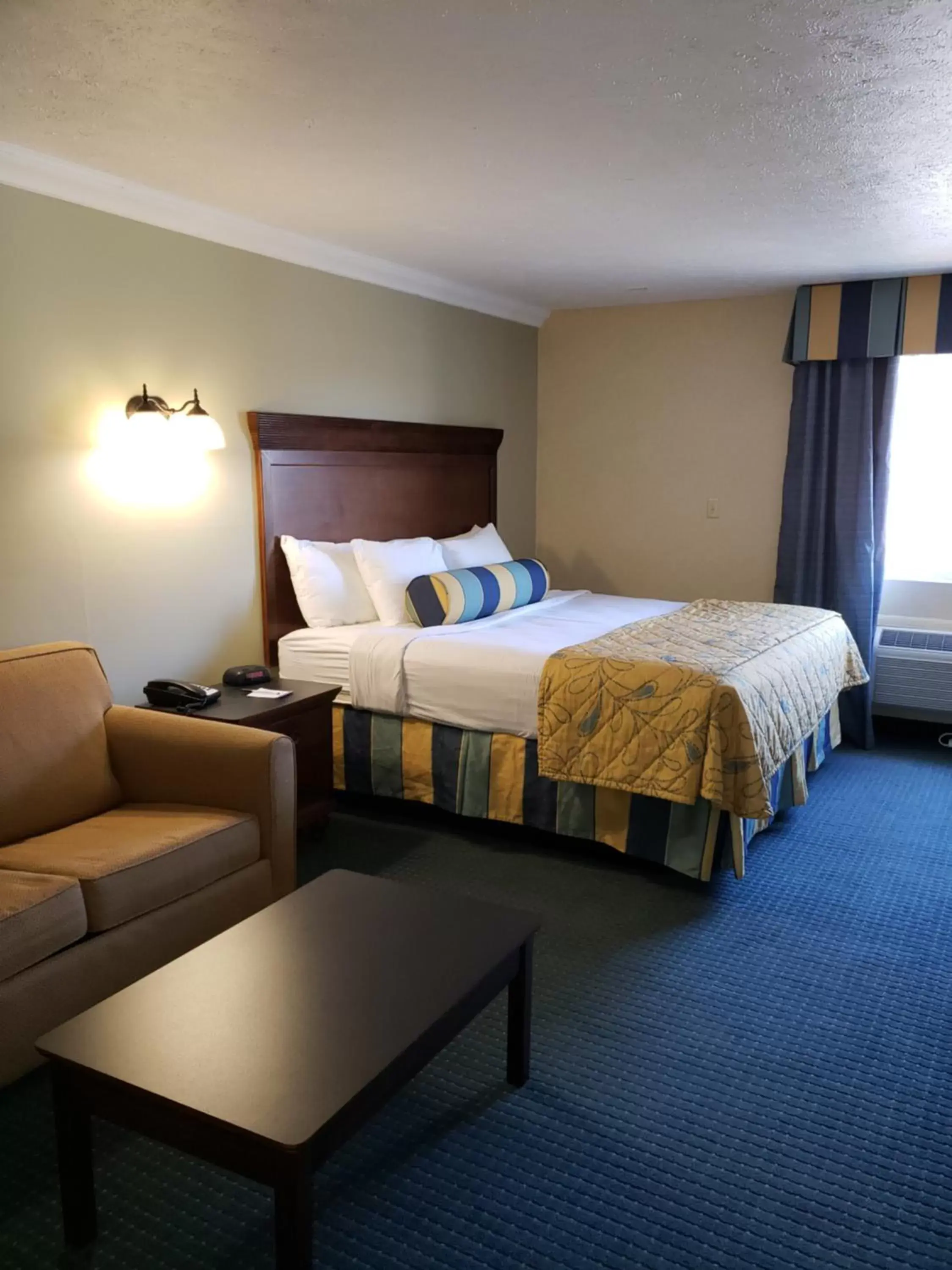 Bed in The Boardwalk Inn