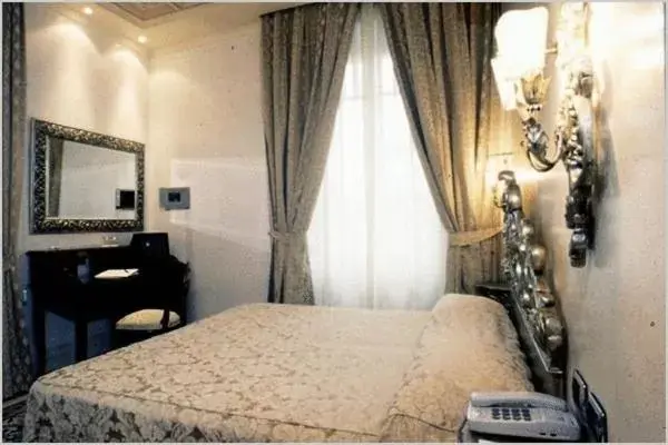 Bed in Hotel Aventino