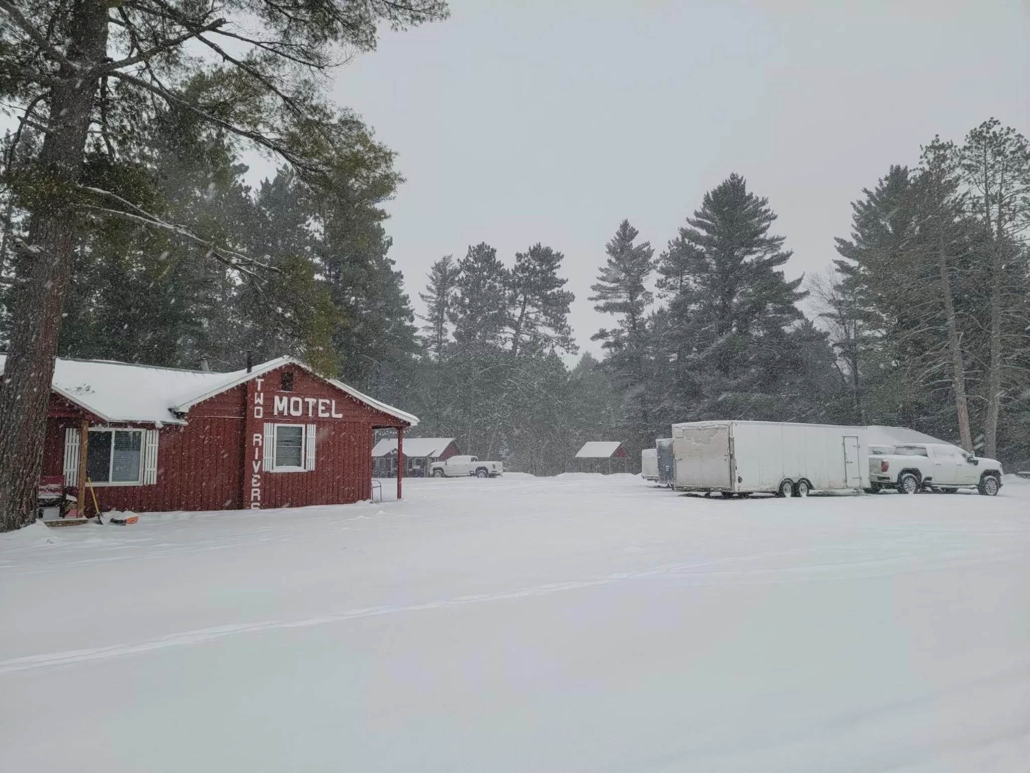 Property building in Two Rivers Motel and Cabins of Kenton, MI