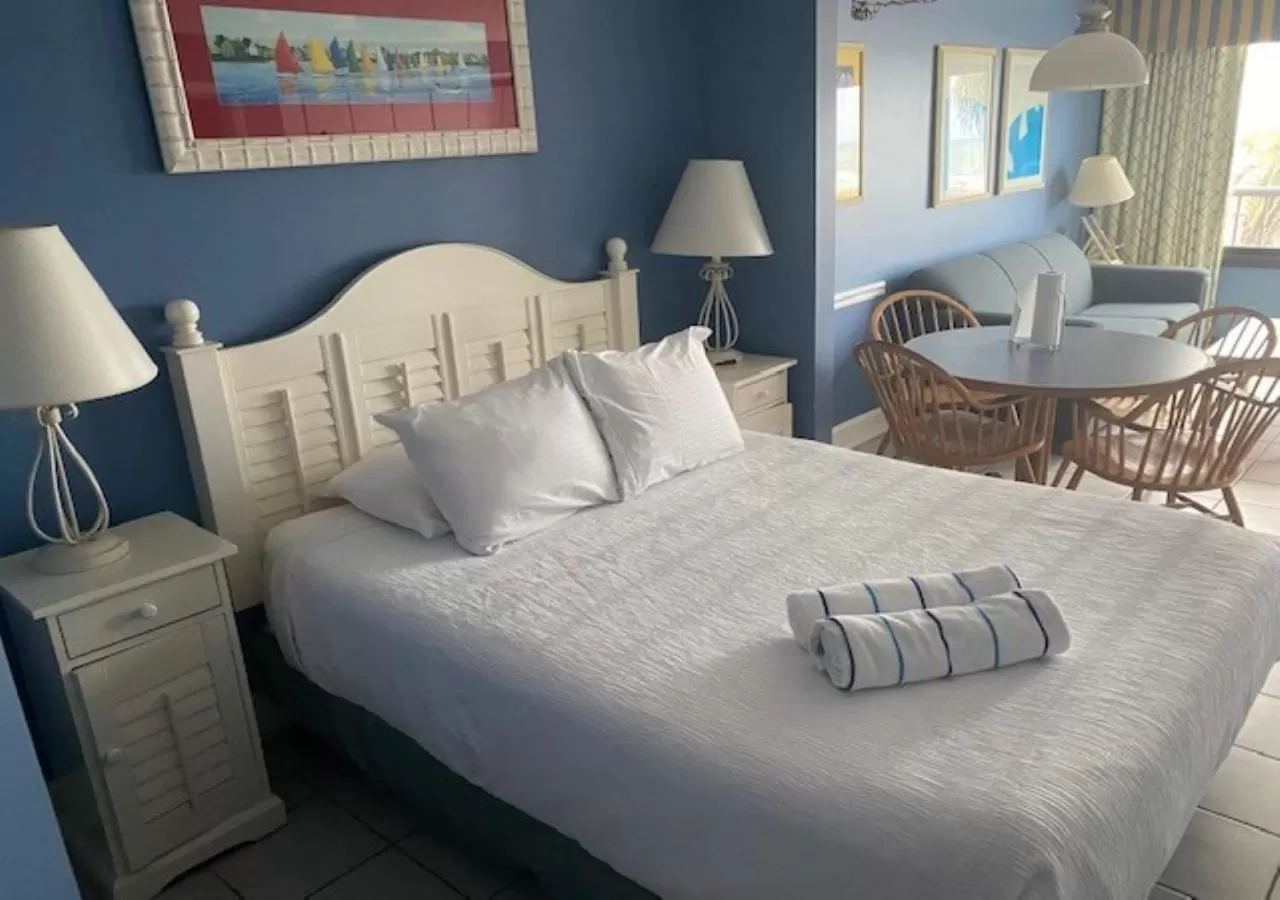 Bedroom, Bed in Ocean Club Resort Myrtle Beach a Ramada by Wyndham