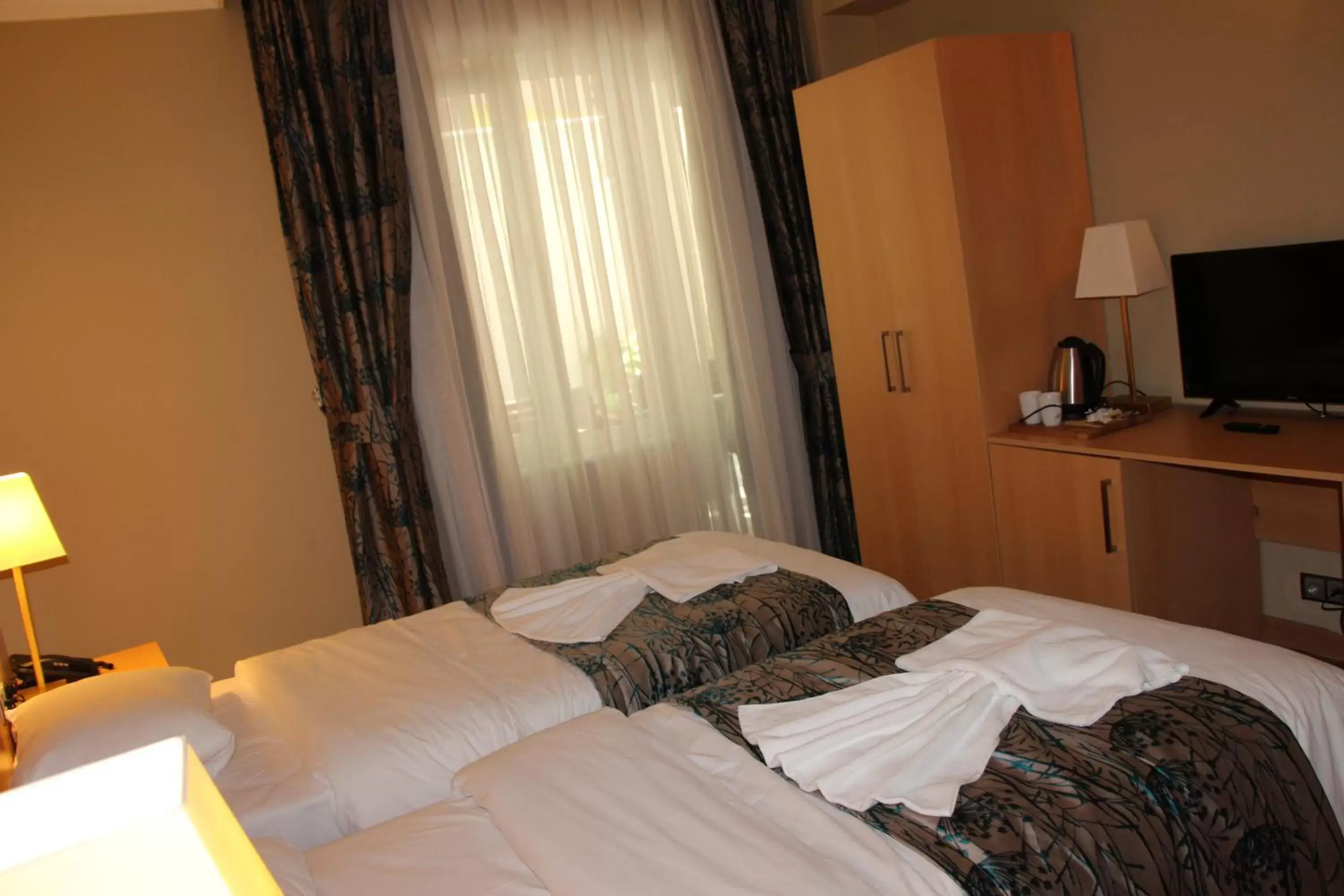 Bed in Artika Hotel