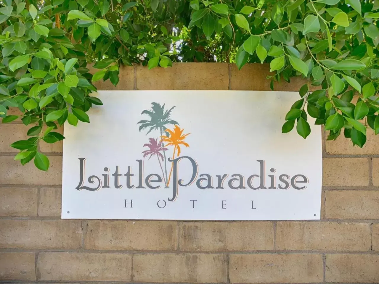 Property logo or sign in Little Paradise Hotel