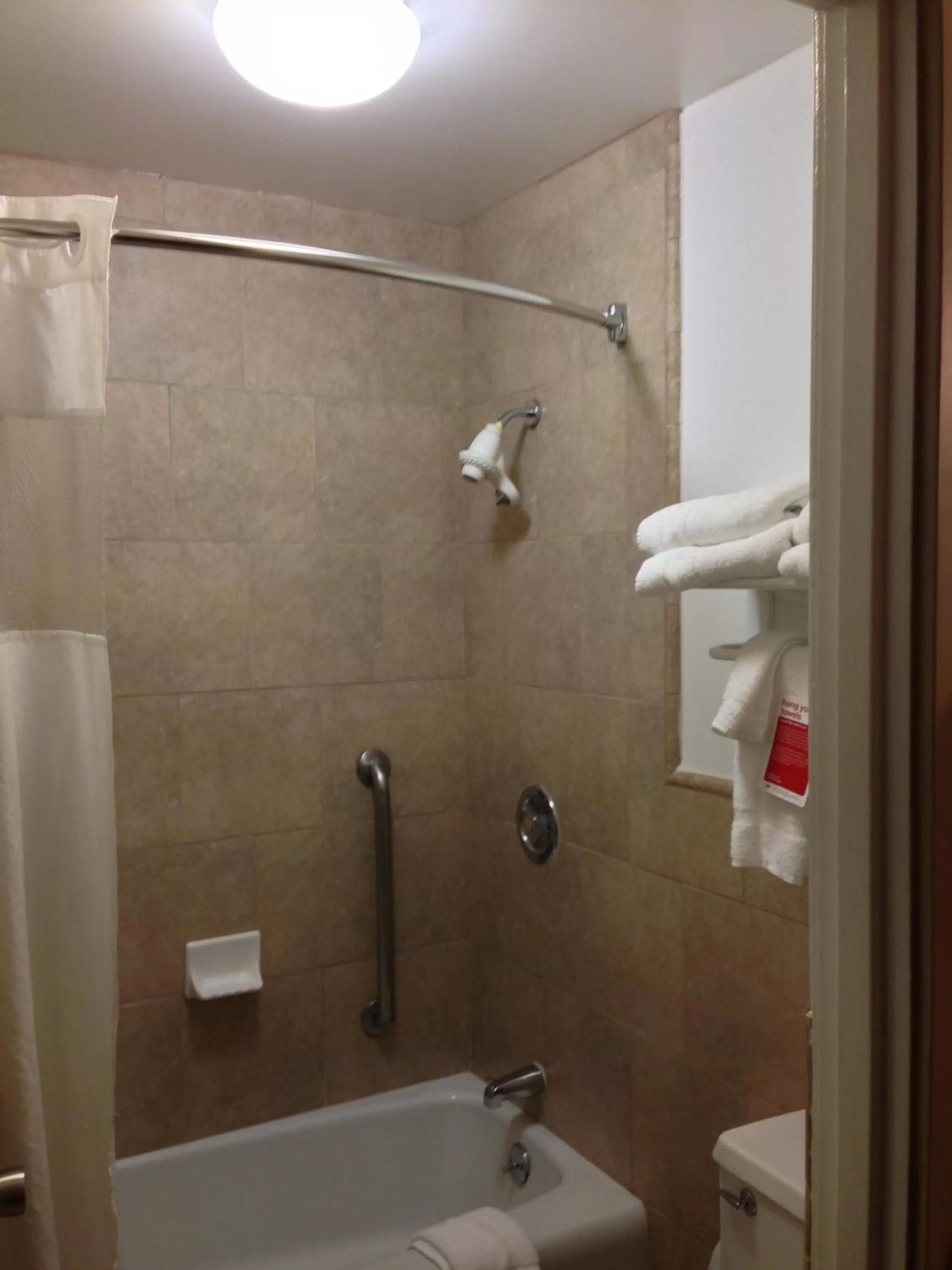 Bathroom in Ramada by Wyndham Fresno North