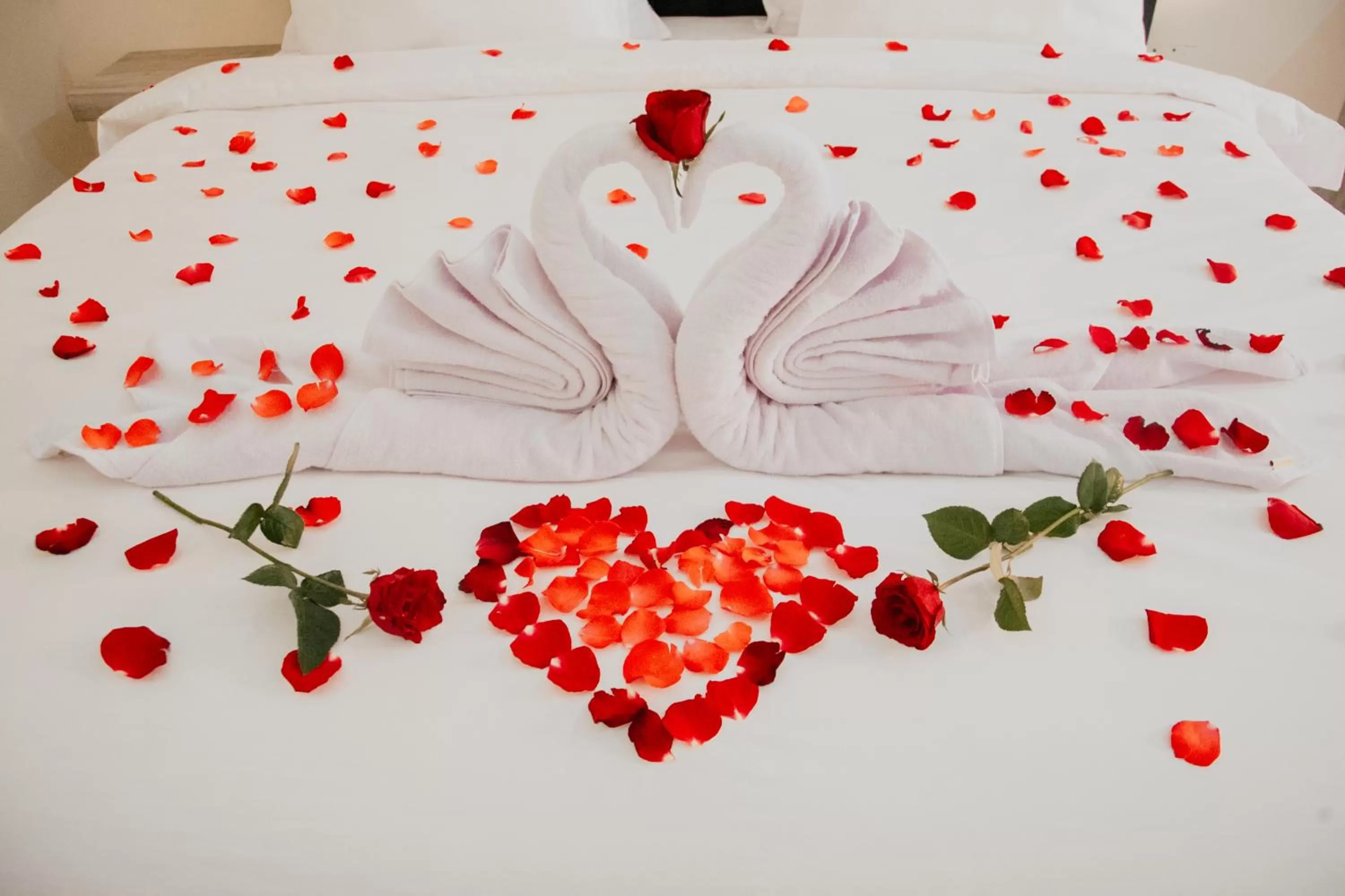 Bed in THE LAVIANA HOTEL