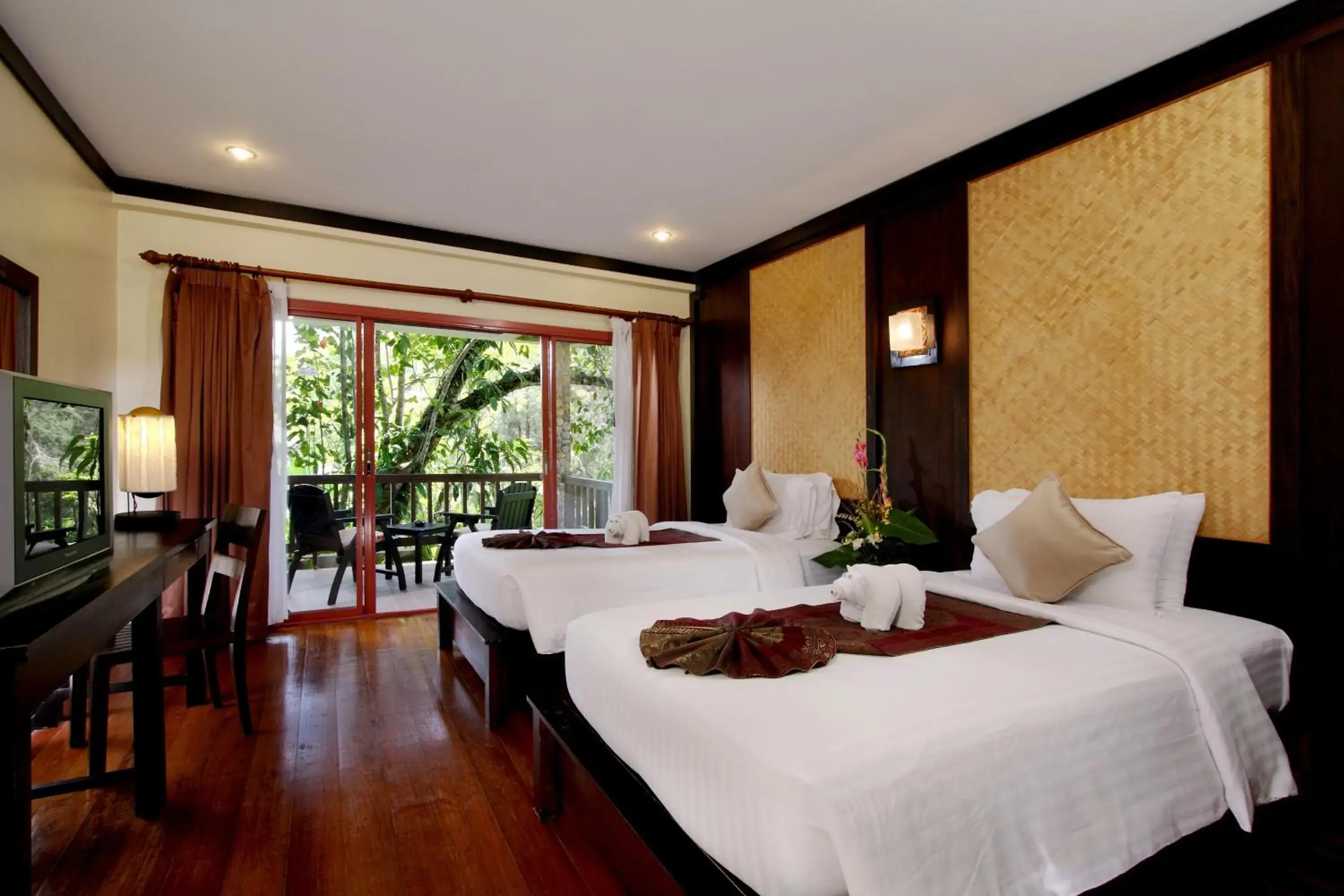 Bed in Khaolak Paradise Resort Bed in Khaolak Paradise Resort