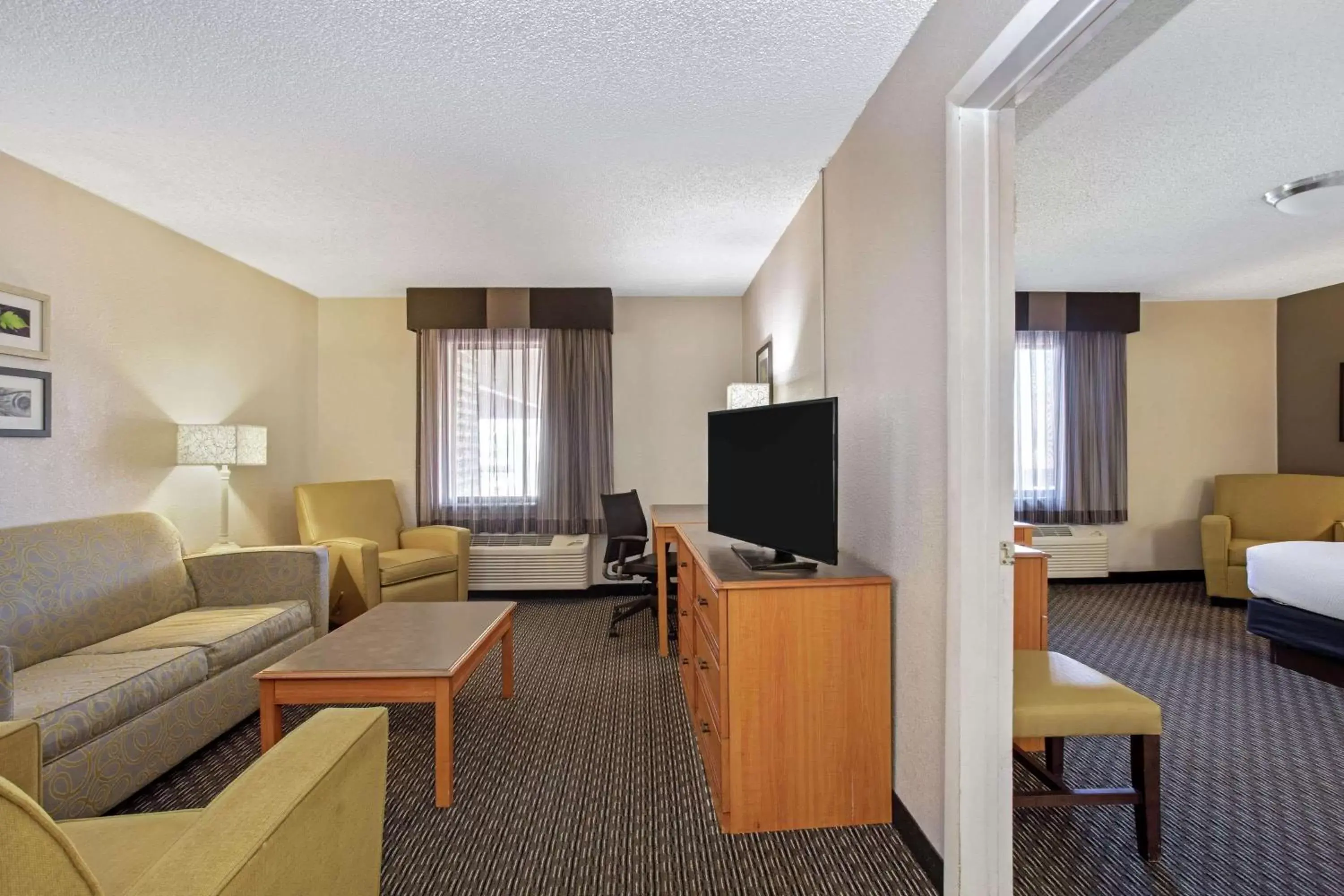 Photo of the whole room, TV/Entertainment Center in La Quinta Inn by Wyndham Tucson East