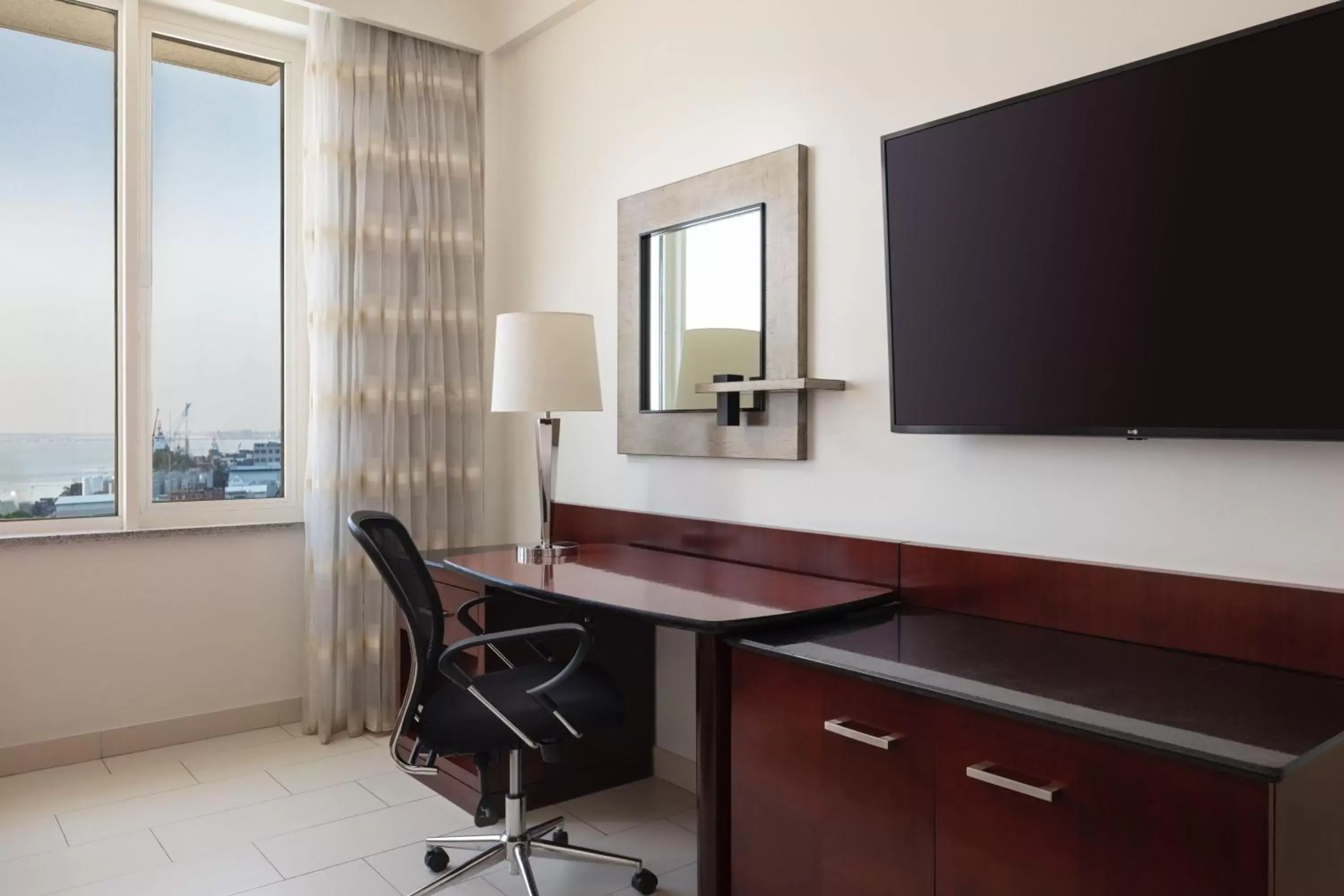 Photo of the whole room, TV/Entertainment Center in Guyana Marriott Hotel Georgetown