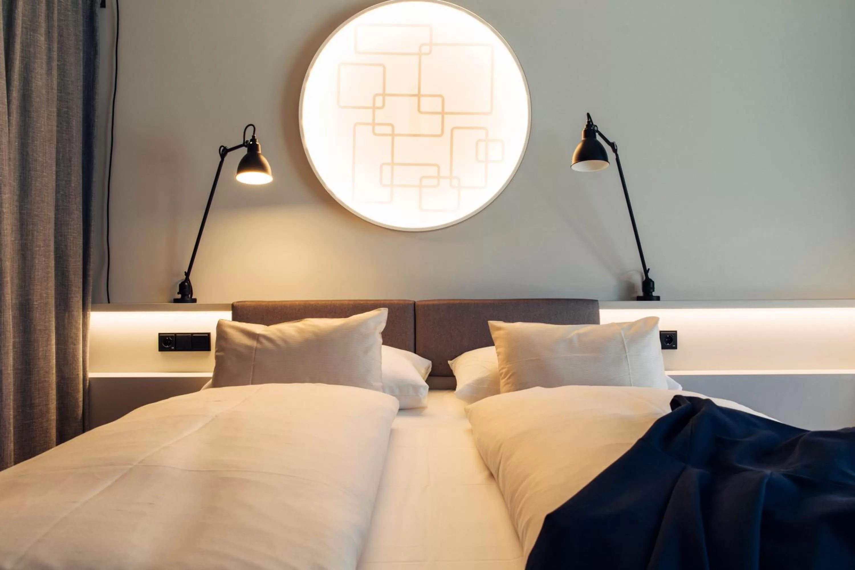 Bed in harry's home Steyr hotel & apartments