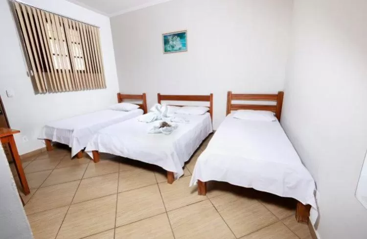 Photo of the whole room, Bed in Hotel Portela III - Aprox 600m do Thermas dos Laranjais e Hot Beach