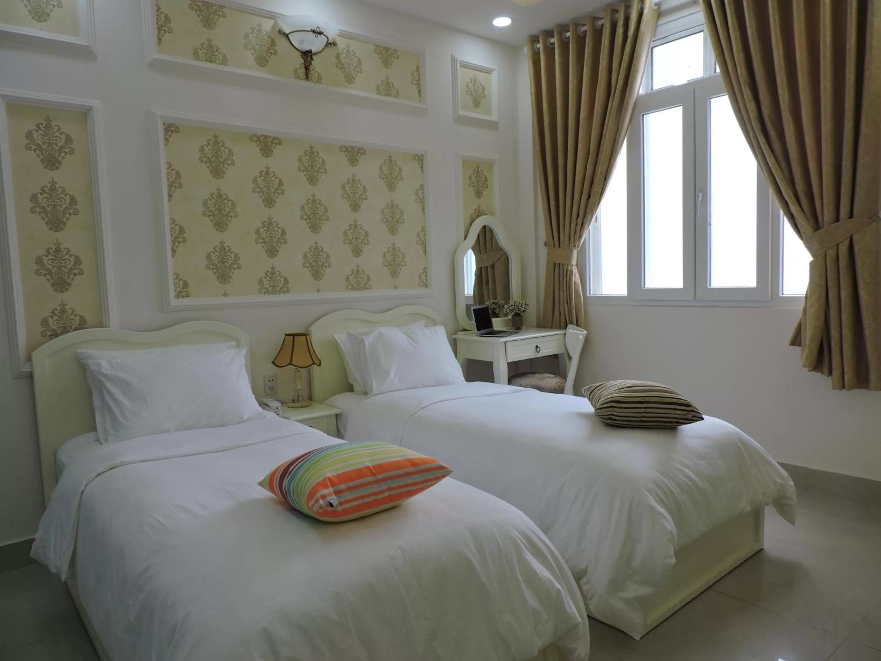 Bed in Chez Lotus Rose