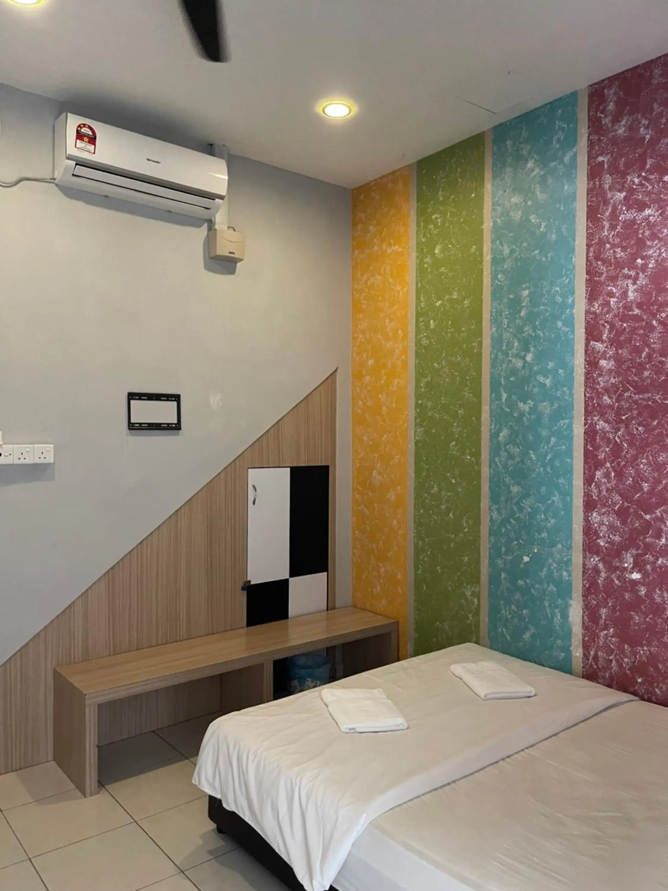 Bed in GOLDEN GUEST HOUSE KUANTAN