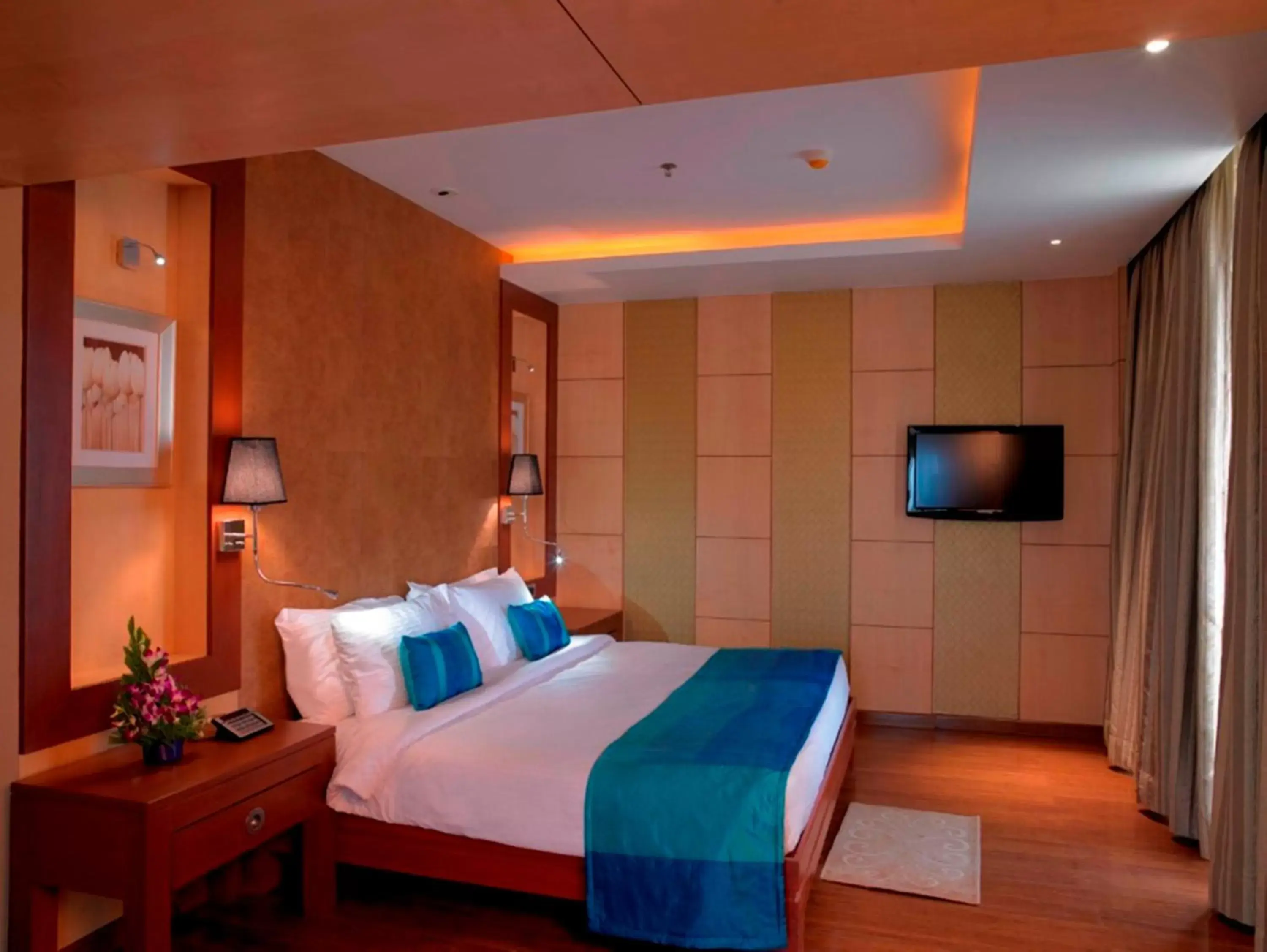 Bed in Royal Orchid Central Kireeti-HAMPI Hospet