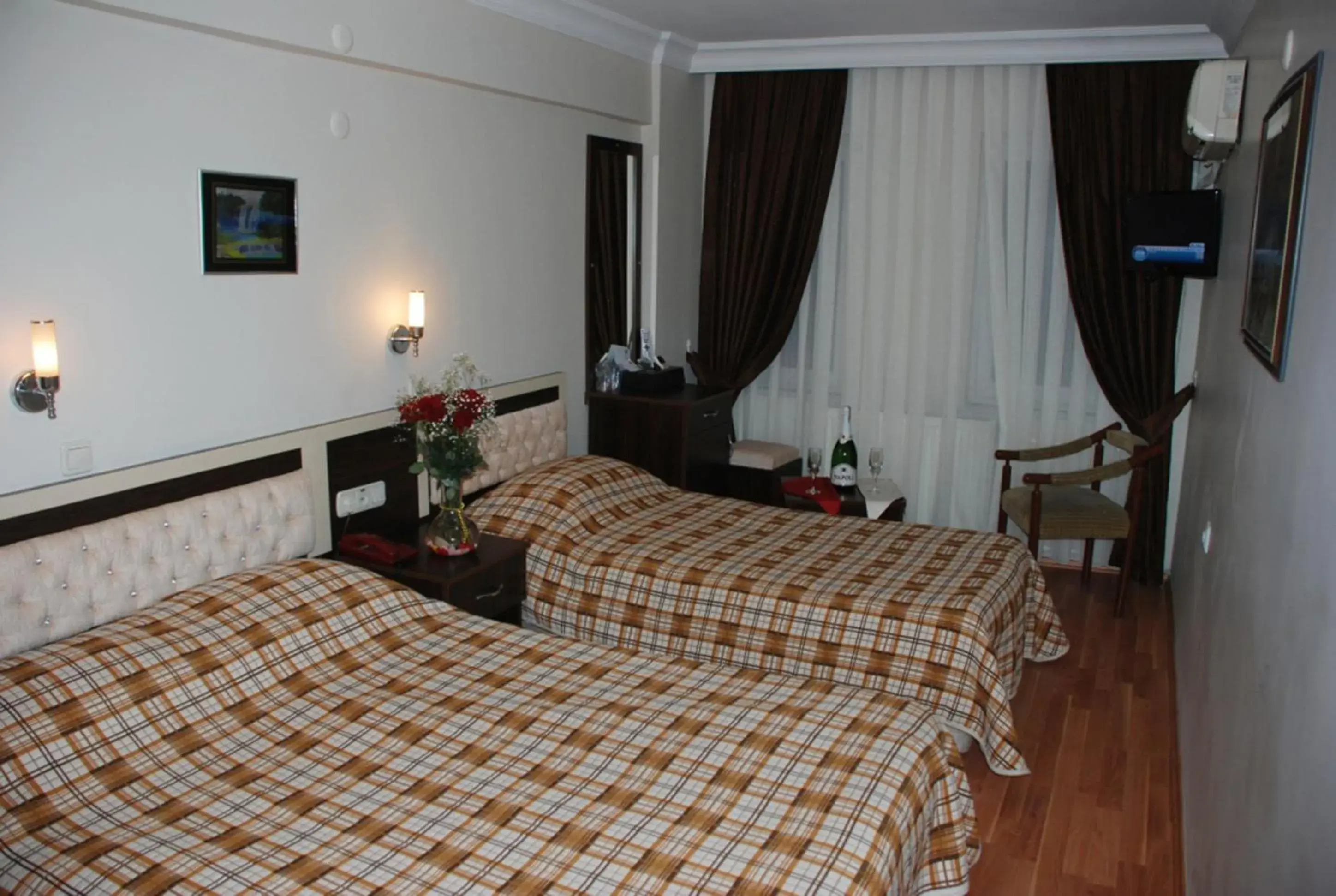 Bed in Grand Mark Hotel